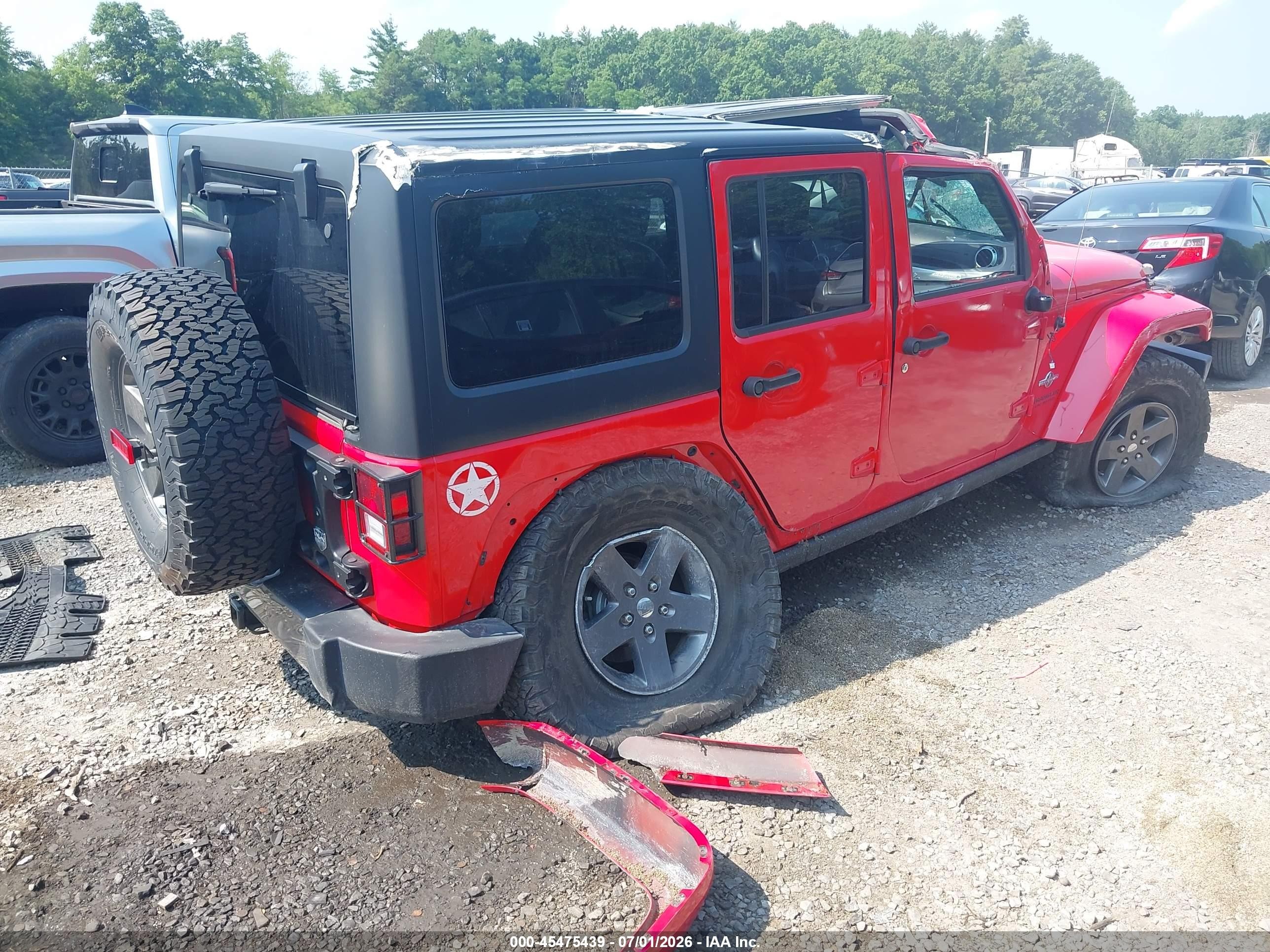 2015 Jeep Wrangler Unlimited Freedom Edition Red vin: 1C4HJWDG1FL593952