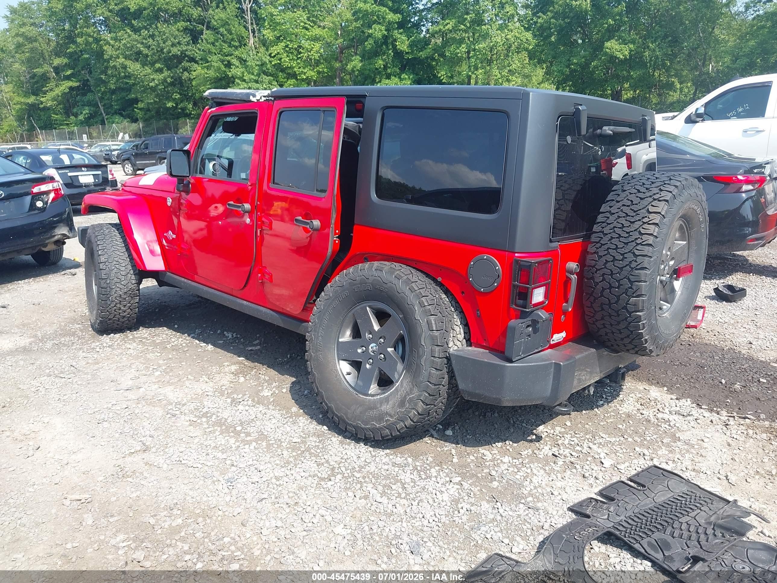 2015 Jeep Wrangler Unlimited Freedom Edition Red vin: 1C4HJWDG1FL593952