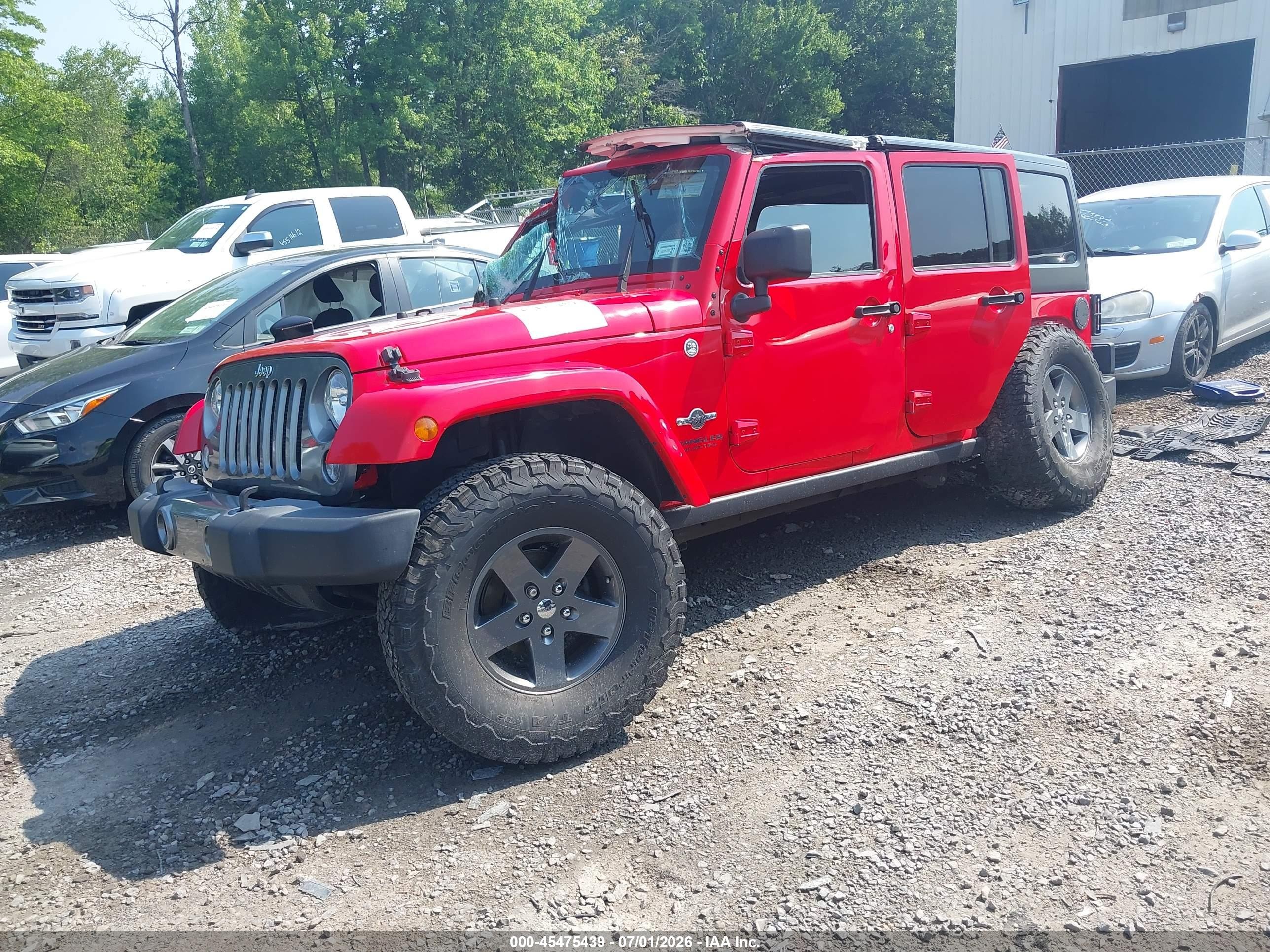 2015 Jeep Wrangler Unlimited Freedom Edition Red vin: 1C4HJWDG1FL593952
