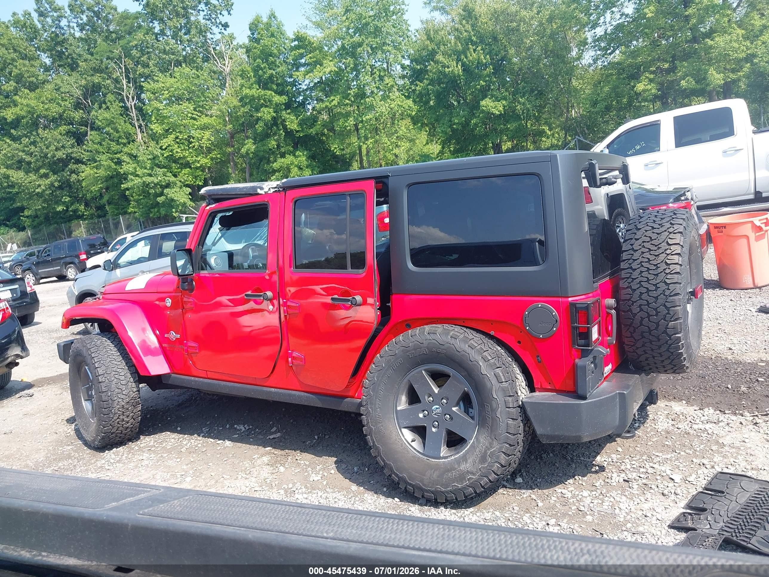 2015 Jeep Wrangler Unlimited Freedom Edition Red vin: 1C4HJWDG1FL593952