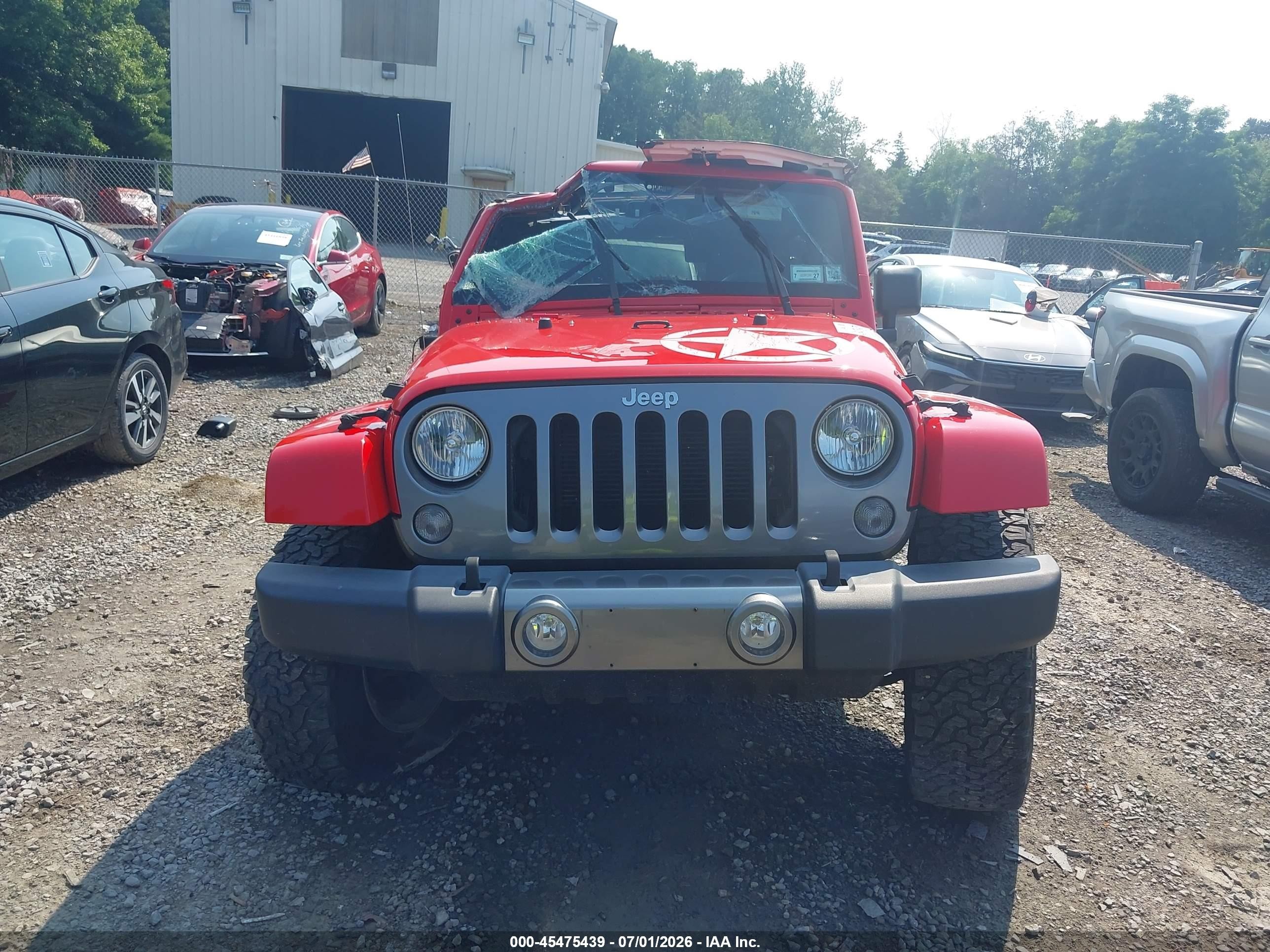 2015 Jeep Wrangler Unlimited Freedom Edition Red vin: 1C4HJWDG1FL593952