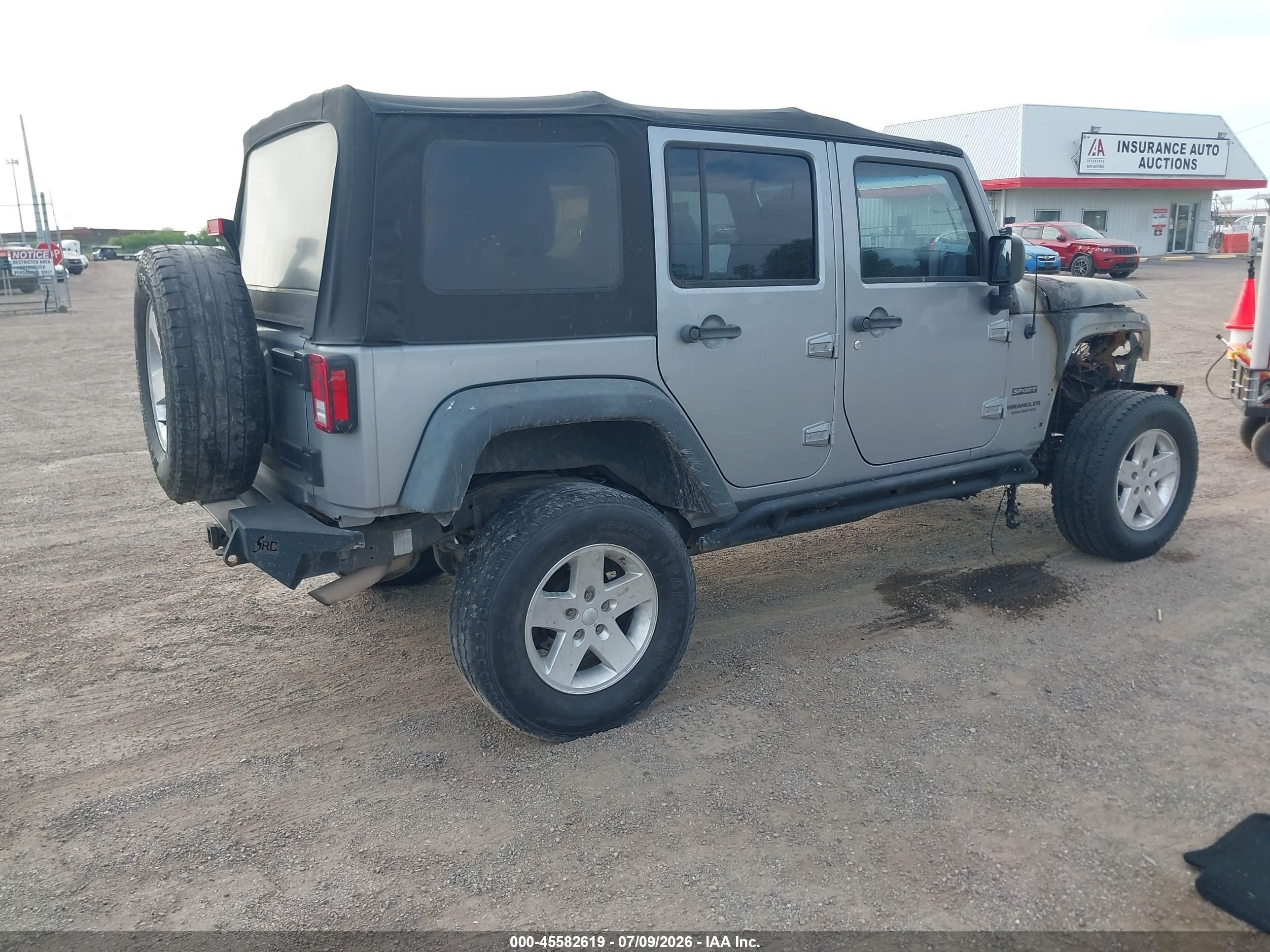 2014 Jeep Wrangler Unlimited Sport Silver vin: 1C4HJWDGXEL133333