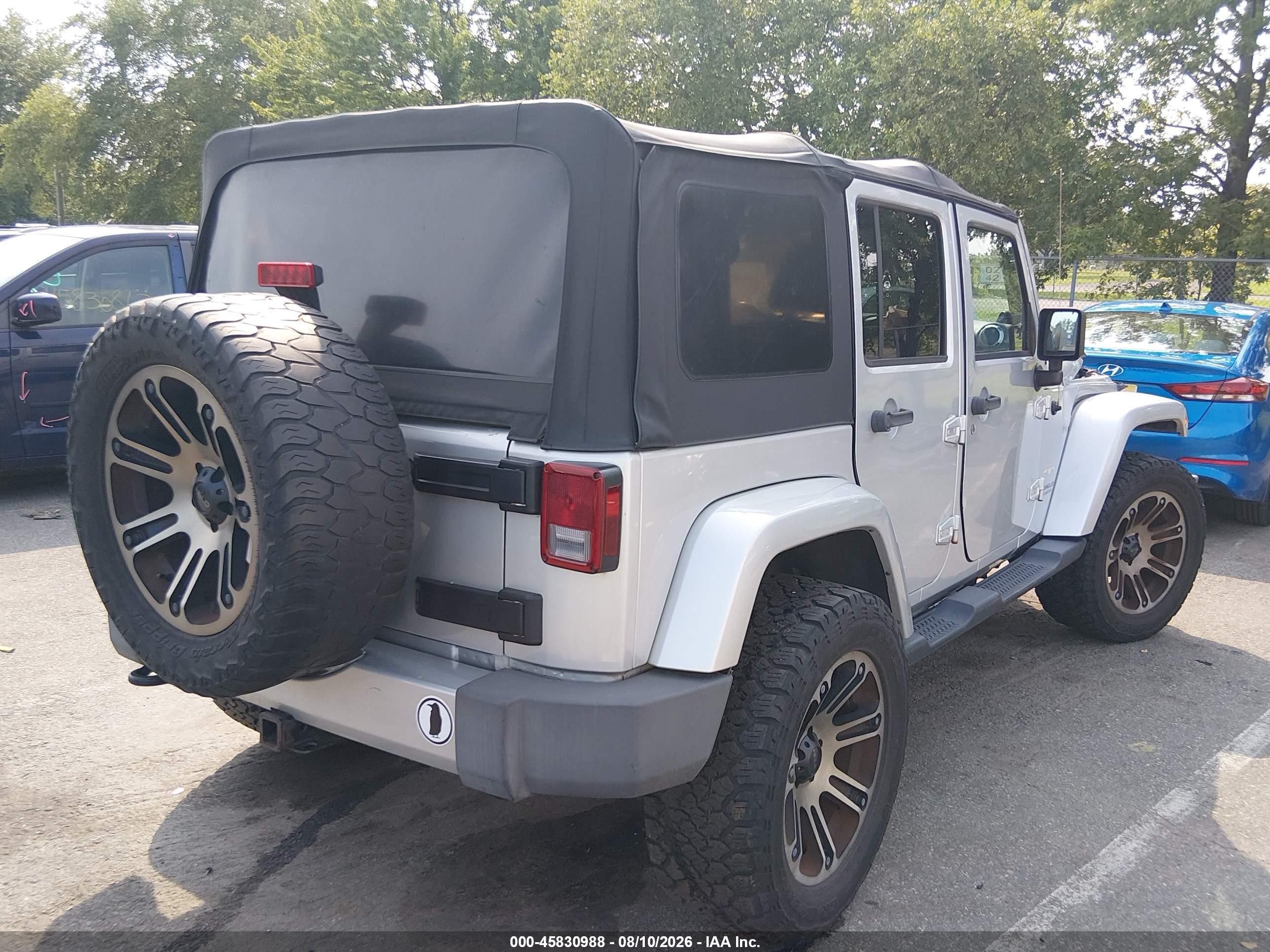 2012 Jeep Wrangler Unlimited Sahara Серебряный vin: 1C4HJWEG1CL157581
