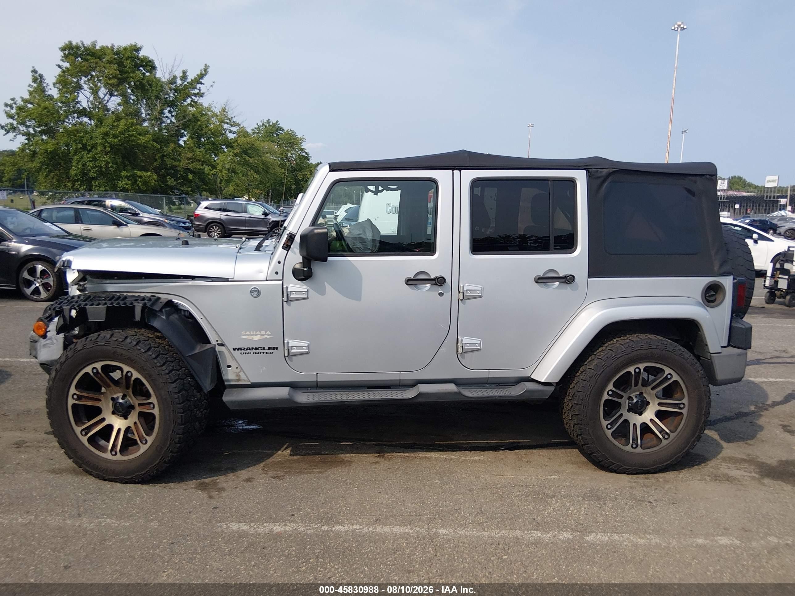 2012 Jeep Wrangler Unlimited Sahara Серебряный vin: 1C4HJWEG1CL157581