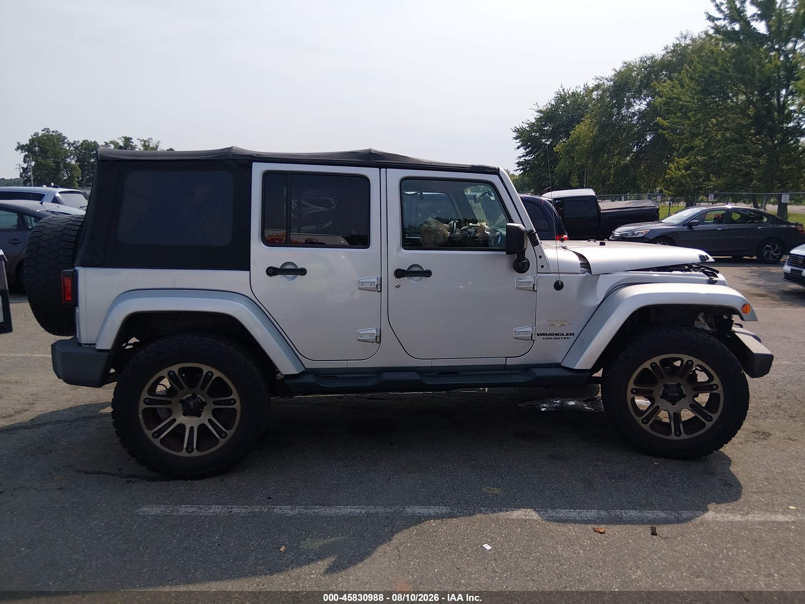 2012 Jeep Wrangler Unlimited Sahara Серебряный vin: 1C4HJWEG1CL157581