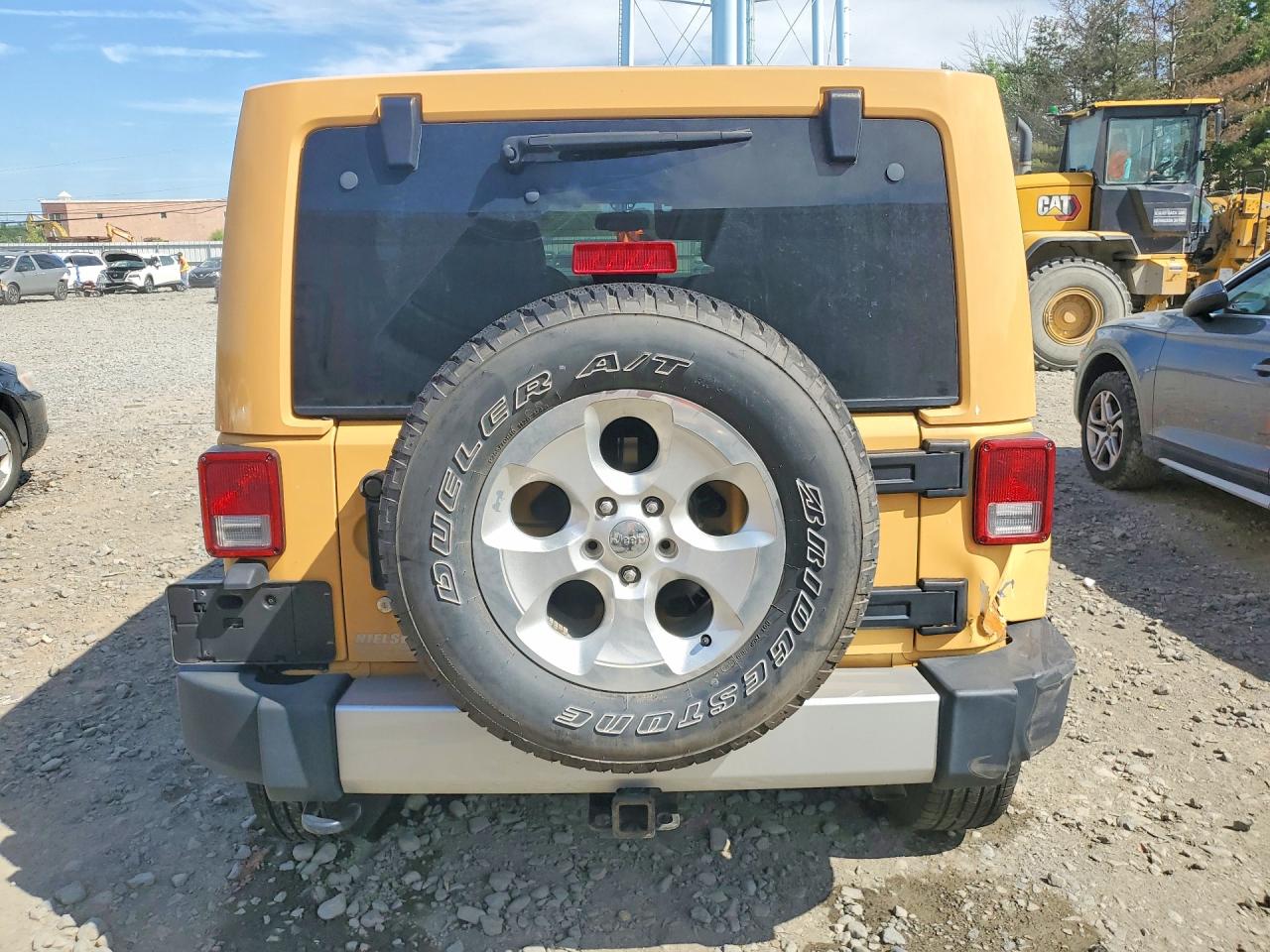 2013 Jeep Wrangler Unlimited Sahara Tan vin: 1C4HJWEG3DL628745
