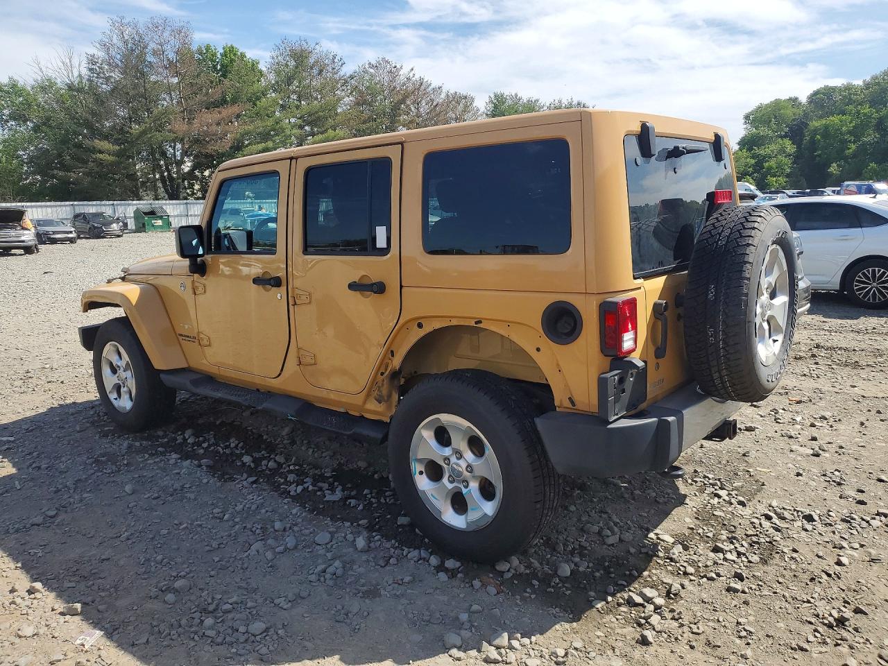 2013 Jeep Wrangler Unlimited Sahara Tan vin: 1C4HJWEG3DL628745