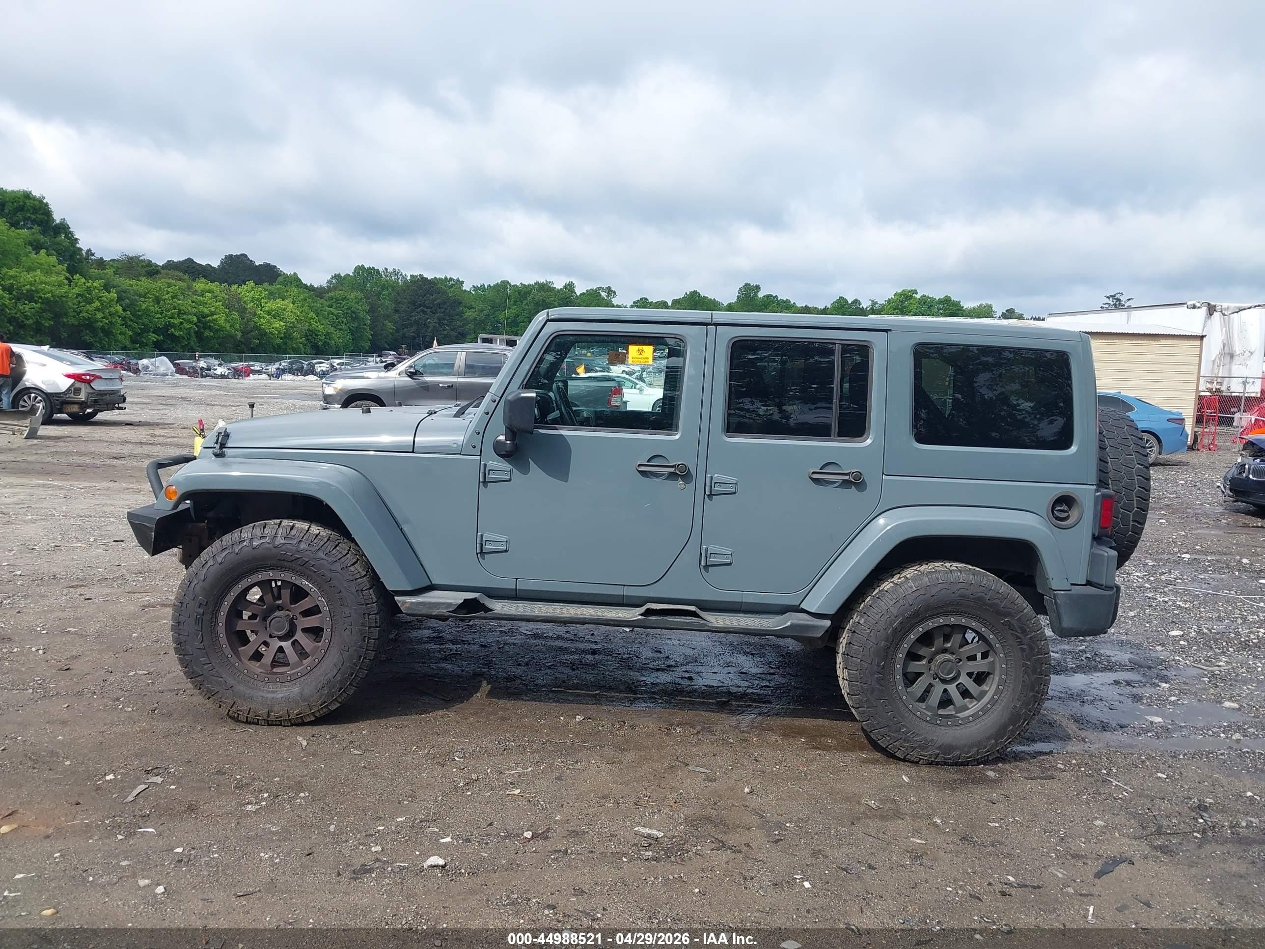 2015 Jeep Wrangler Unlimited Sahara Зеленый vin: 1C4HJWEG3FL528440