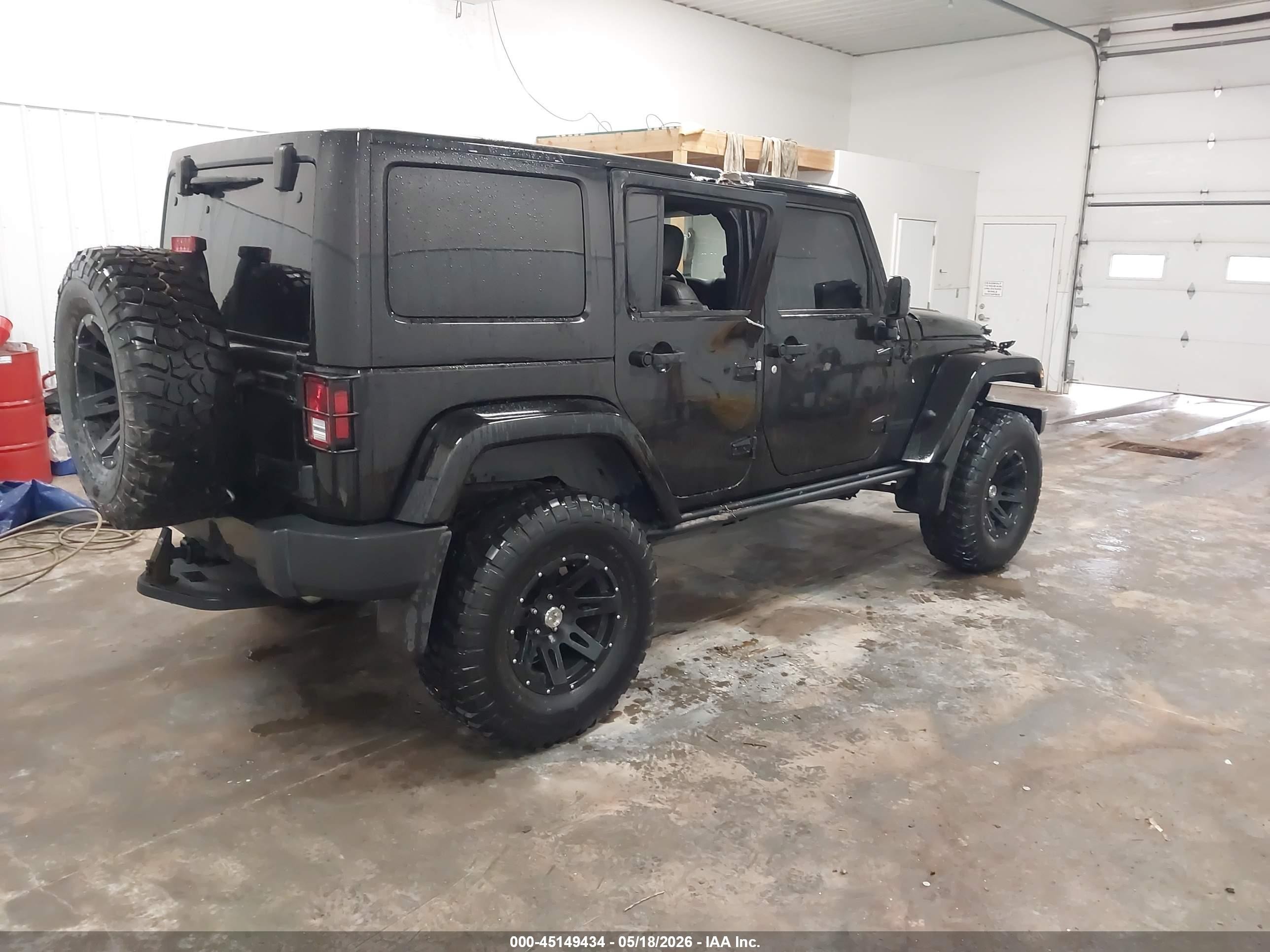 2015 Jeep Wrangler Unlimited Altitude Black vin: 1C4HJWEG3FL713944