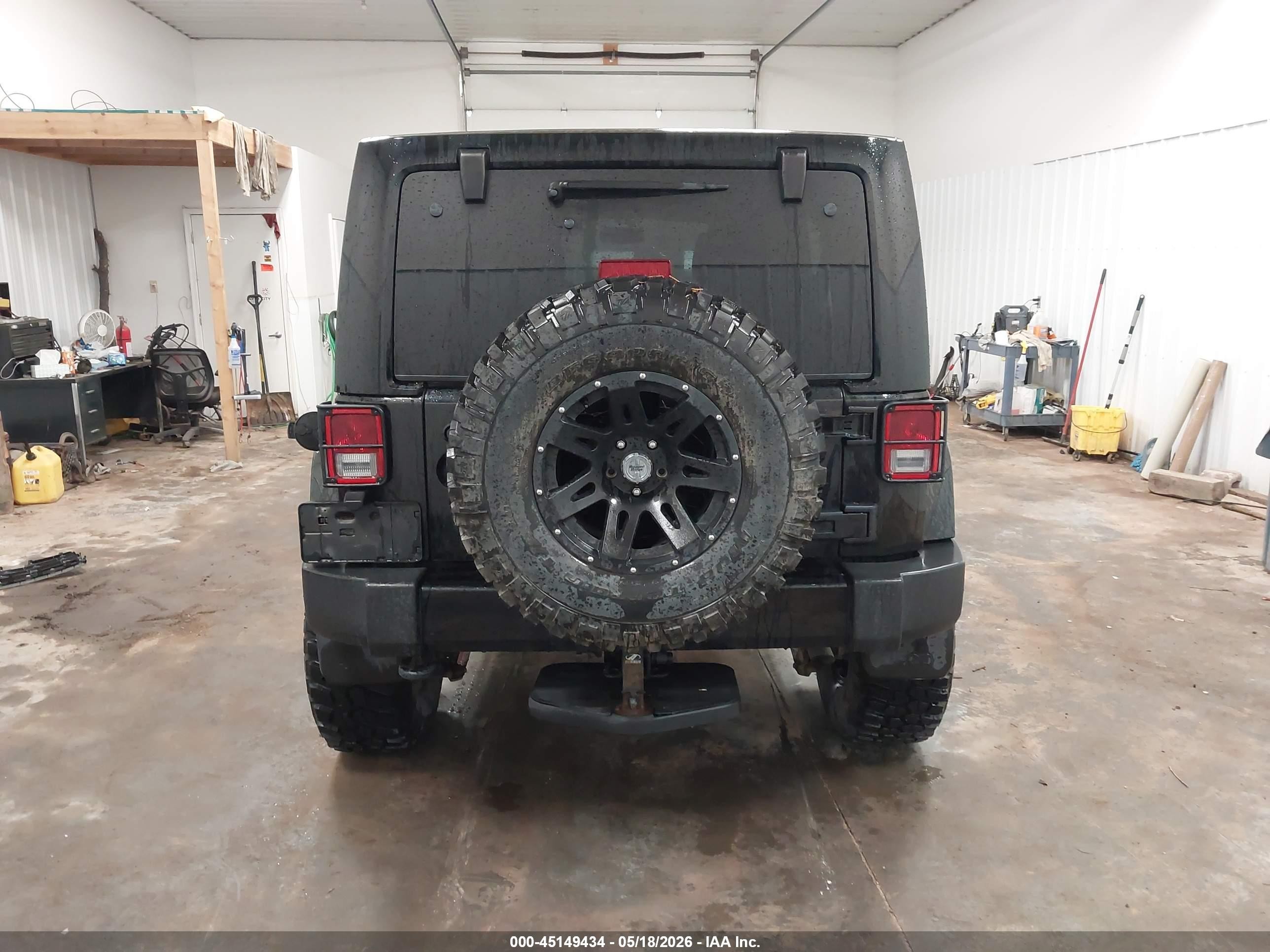 2015 Jeep Wrangler Unlimited Altitude Black vin: 1C4HJWEG3FL713944