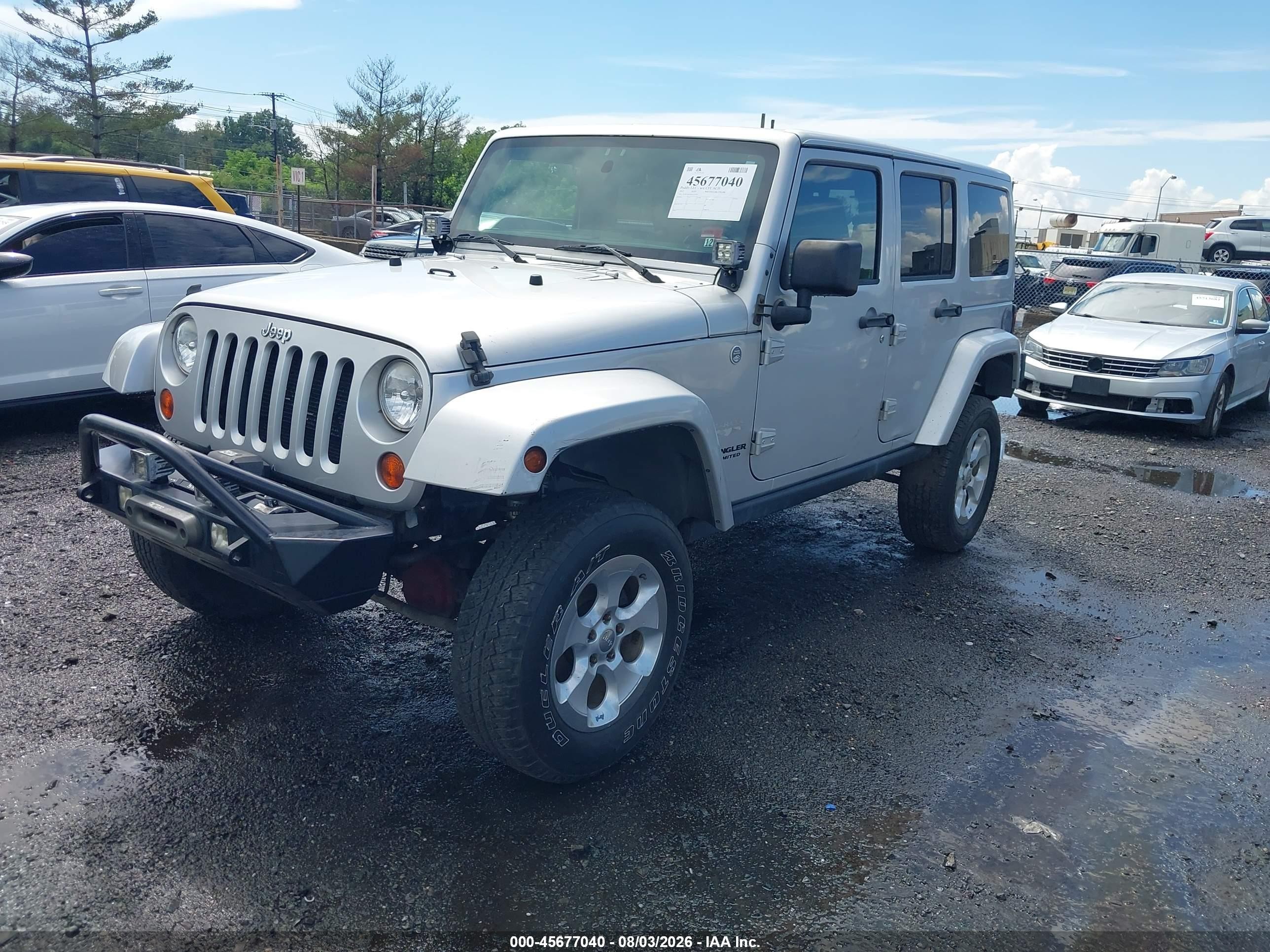 2012 Jeep Wrangler Unlimited Sahara Silver vin: 1C4HJWEG4CL122470