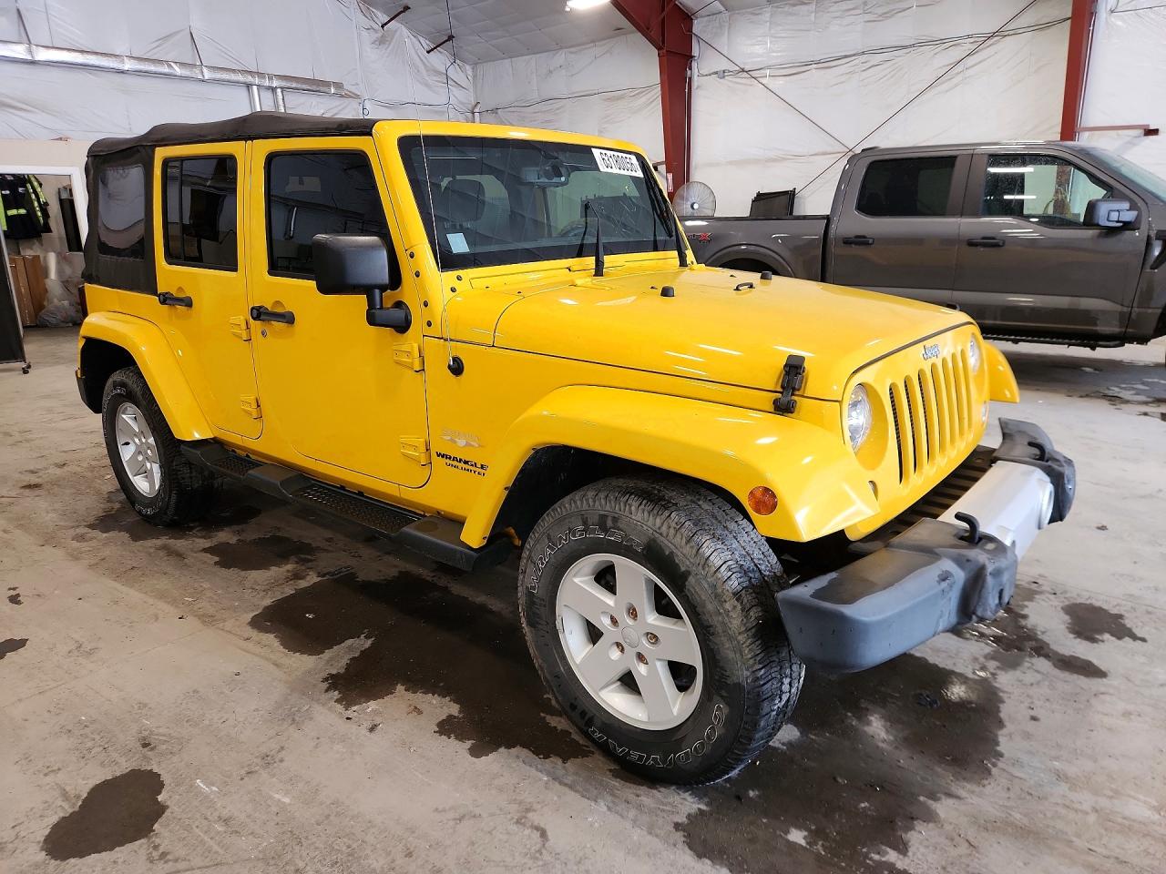 2015 Jeep Wrangler Unlimited Sahara Yellow vin: 1C4HJWEG4FL560832