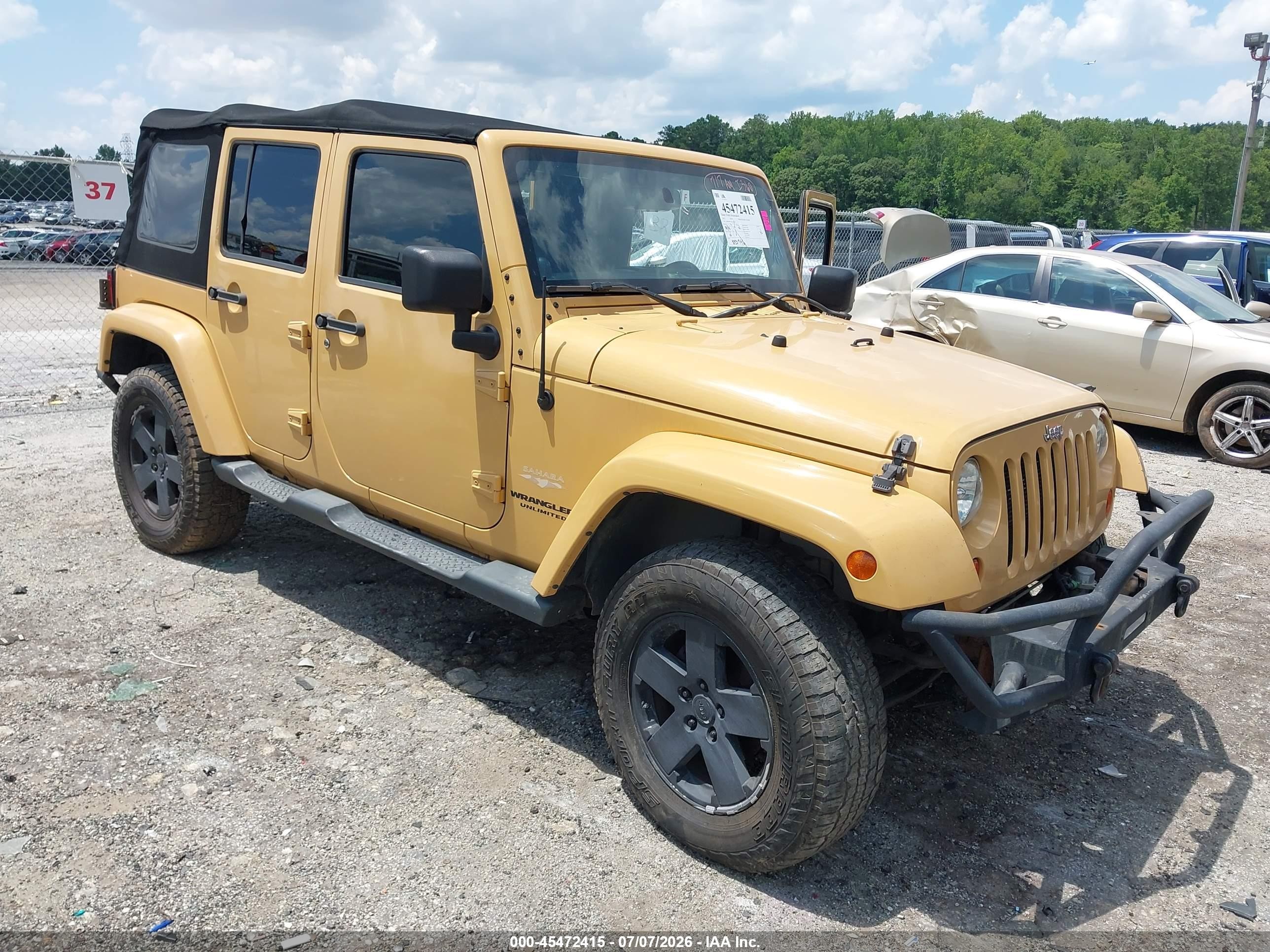 2013 Jeep Wrangler Unlimited Sahara Tan vin: 1C4HJWEG5DL629184