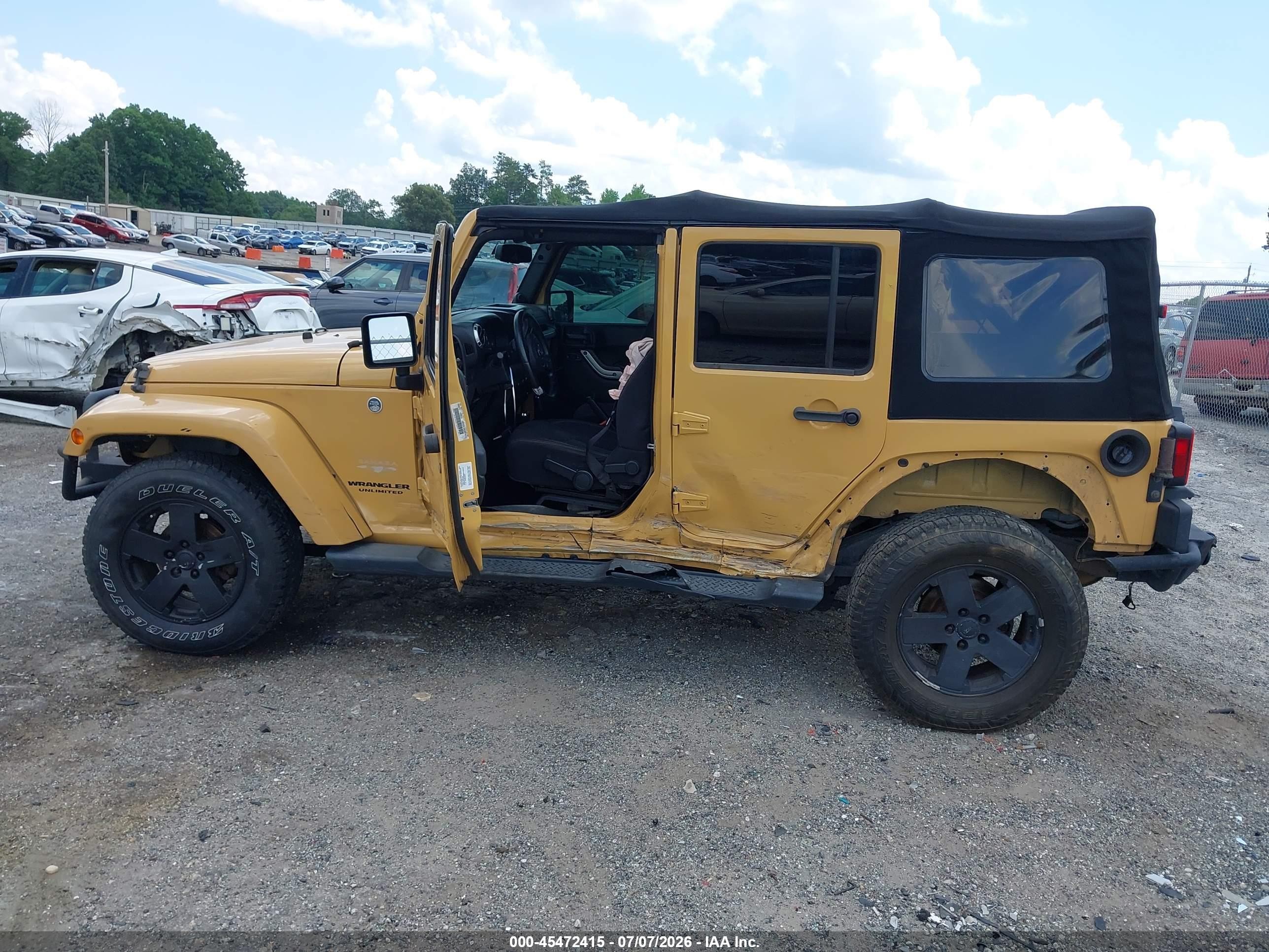 2013 Jeep Wrangler Unlimited Sahara Tan vin: 1C4HJWEG5DL629184