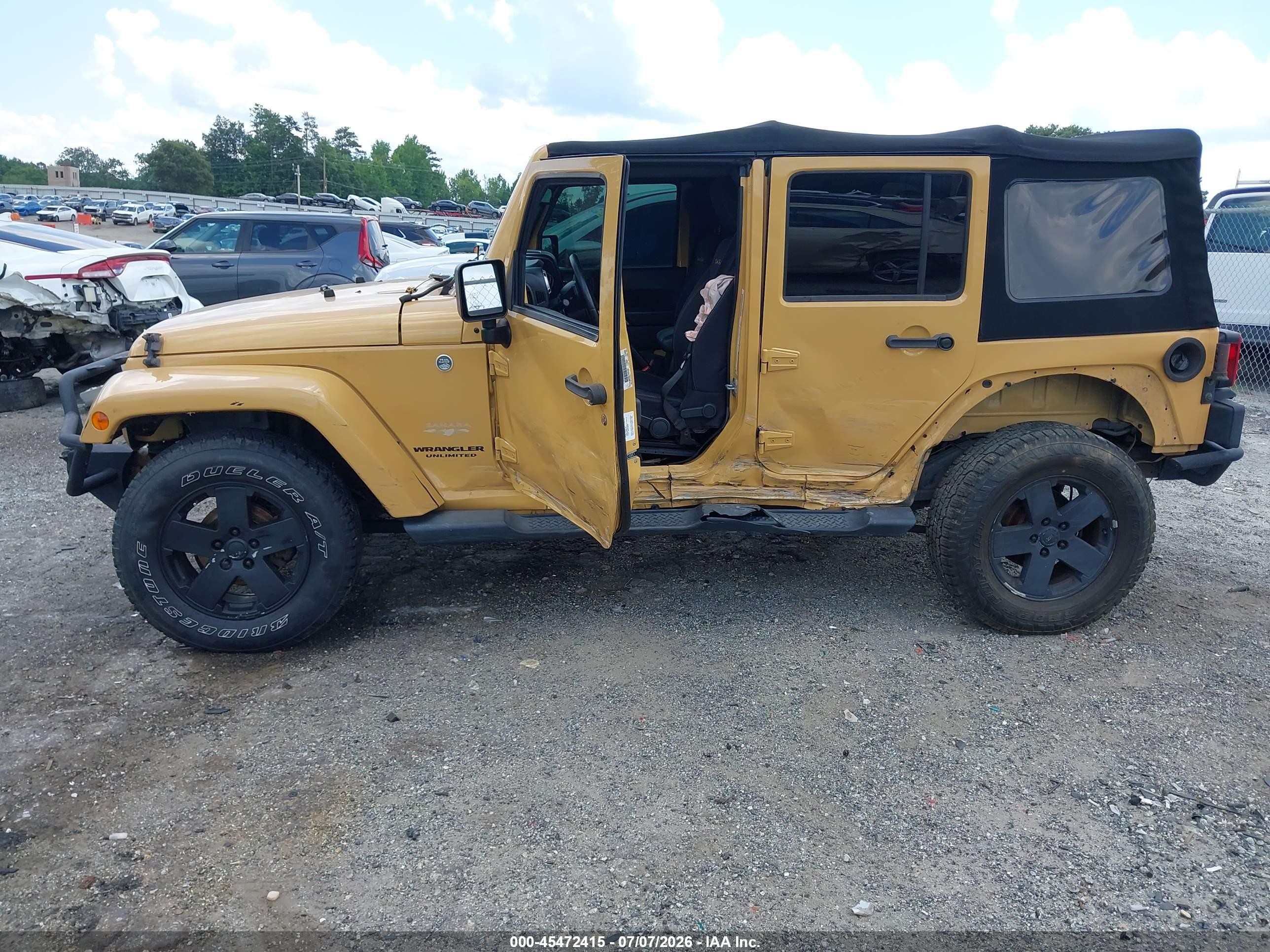 2013 Jeep Wrangler Unlimited Sahara Tan vin: 1C4HJWEG5DL629184