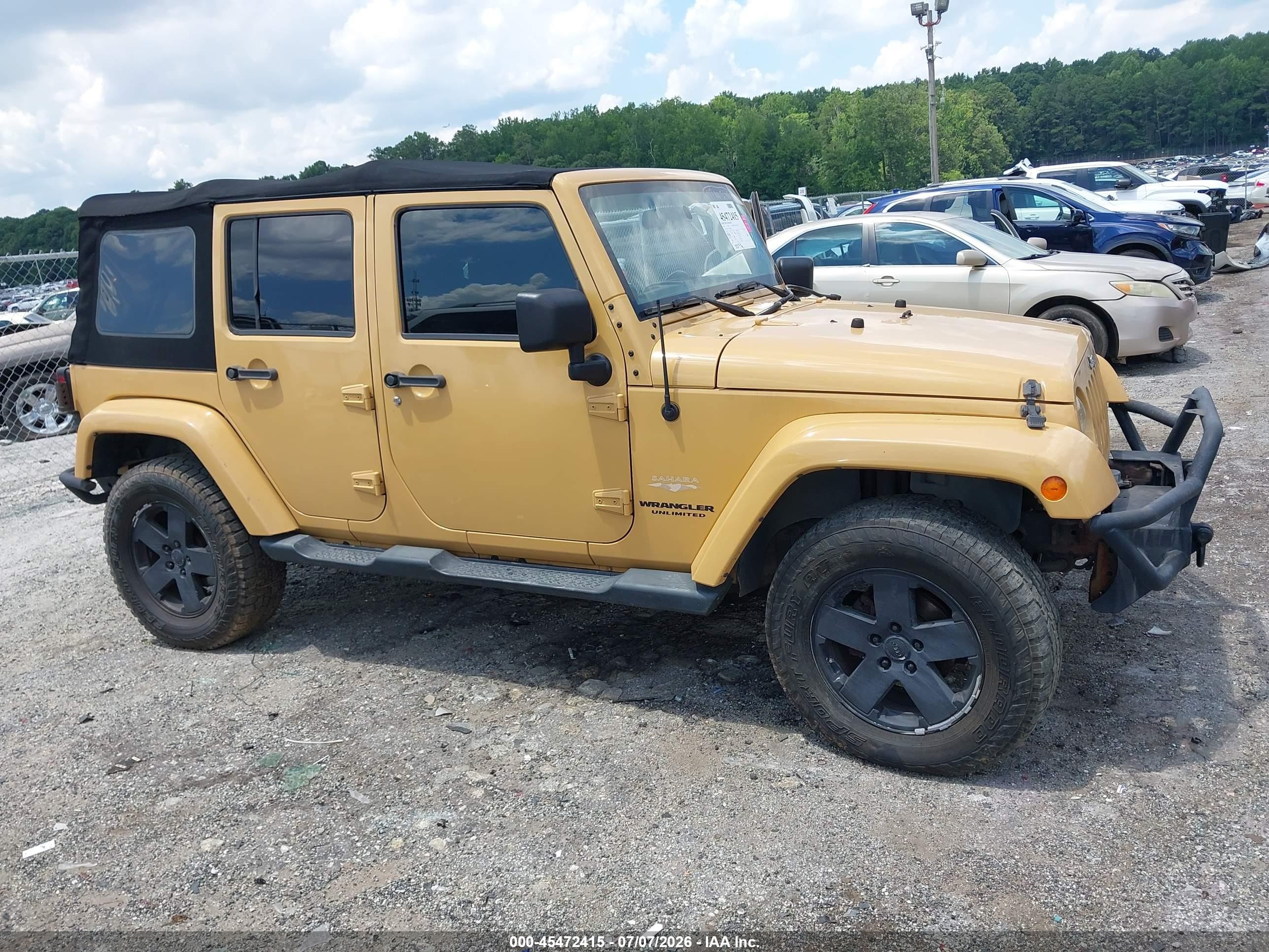 2013 Jeep Wrangler Unlimited Sahara Tan vin: 1C4HJWEG5DL629184