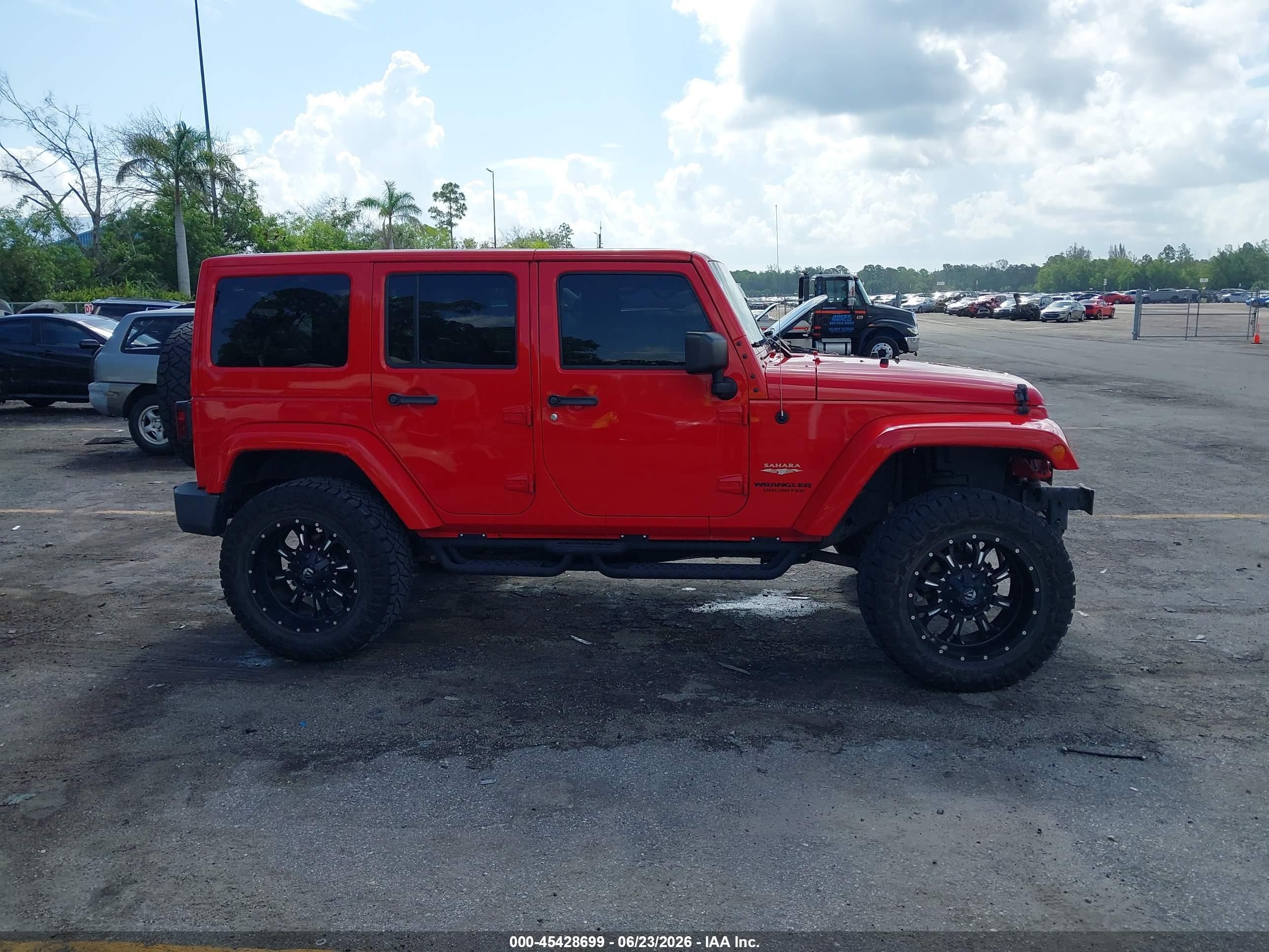 2015 Jeep Wrangler Unlimited Sahara Red vin: 1C4HJWEG5FL537799