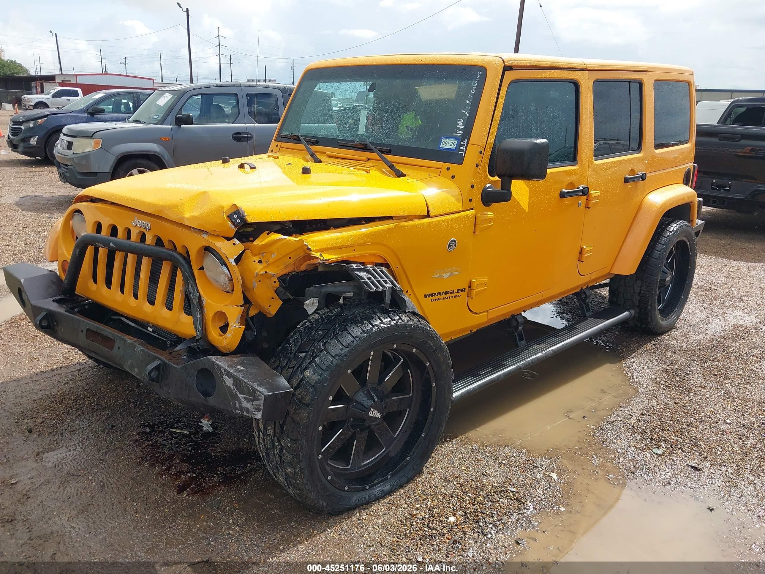2012 Jeep Wrangler Unlimited Sahara Yellow vin: 1C4HJWEG6CL161240