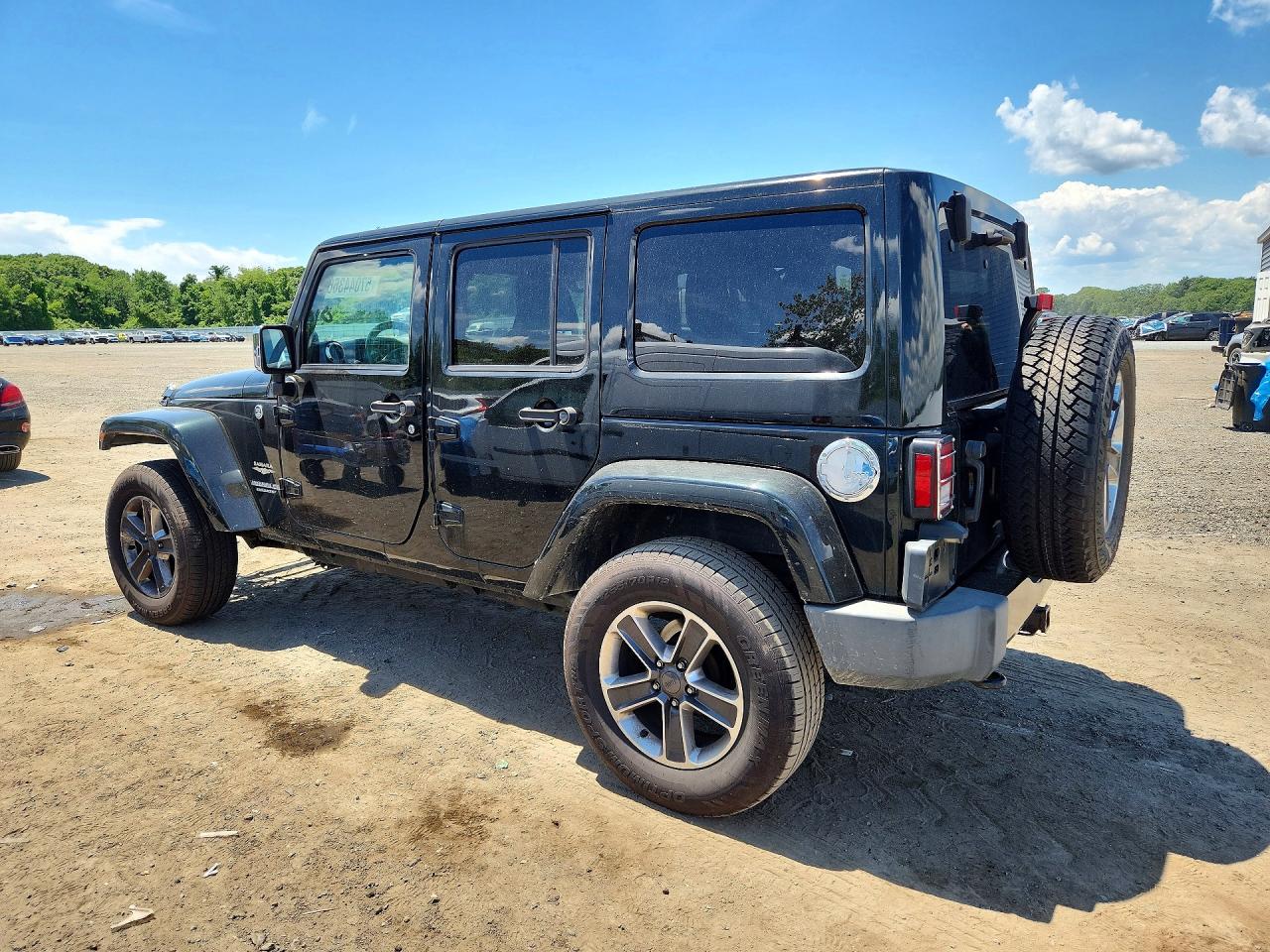 2012 Jeep Wrangler Unlimited Sahara Черный vin: 1C4HJWEG7CL173428