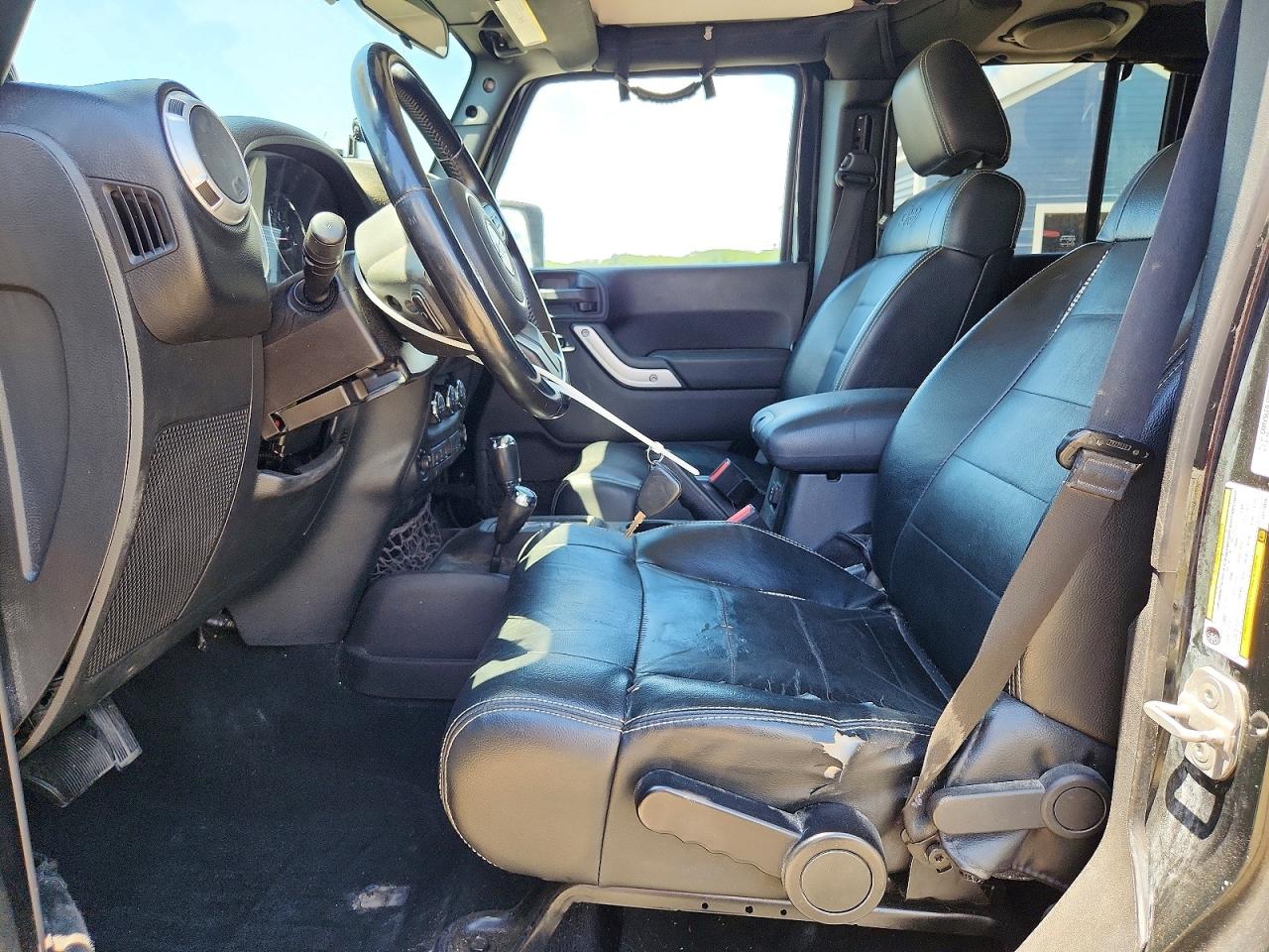 2012 Jeep Wrangler Unlimited Sahara Черный vin: 1C4HJWEG7CL173428