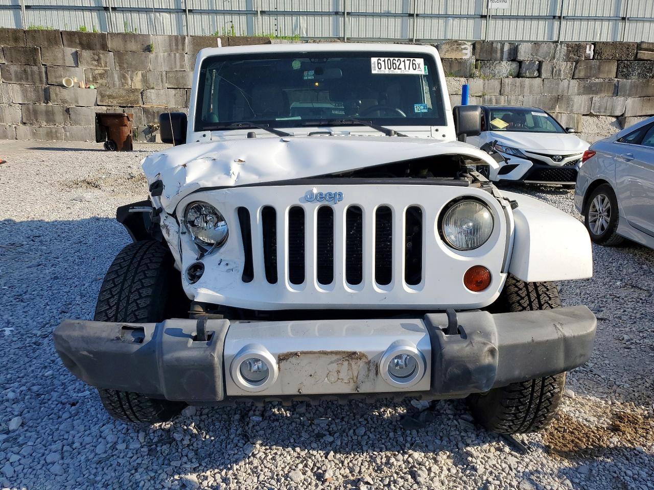2012 Jeep Wrangler Unlimited Sahara Белый vin: 1C4HJWEG8CL139112