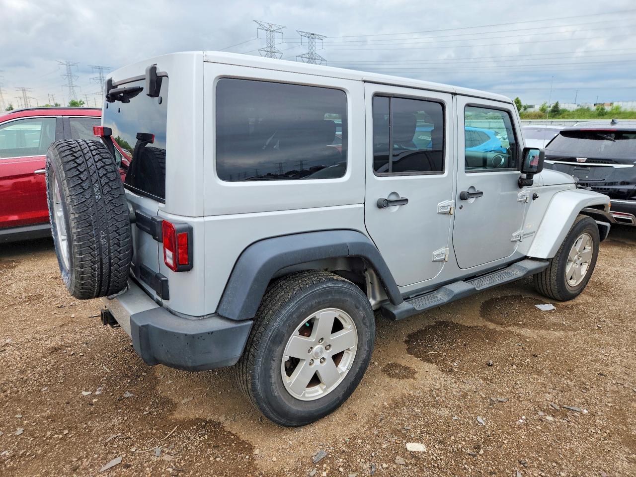 2012 Jeep Wrangler Unlimited Sahara Silver vin: 1C4HJWEG8CL232678