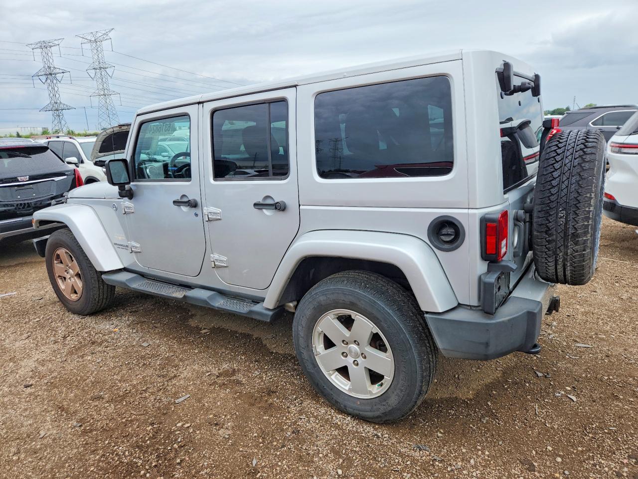 2012 Jeep Wrangler Unlimited Sahara Silver vin: 1C4HJWEG8CL232678