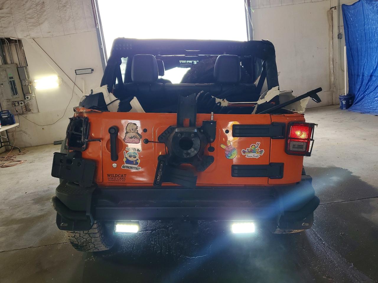 2013 Jeep Wrangler Unlimited Sahara Оранжевый vin: 1C4HJWEG9DL565022