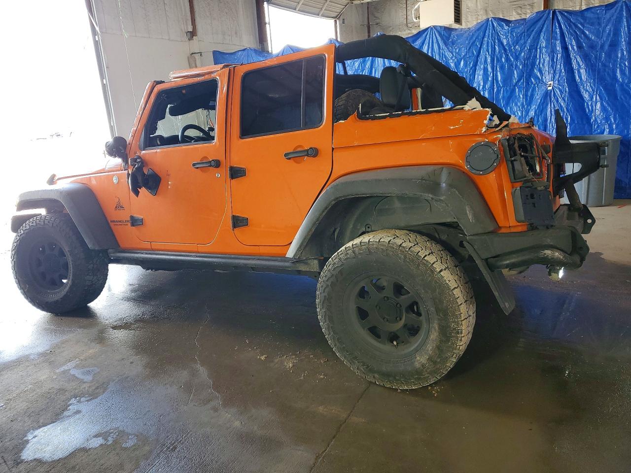 2013 Jeep Wrangler Unlimited Sahara Оранжевый vin: 1C4HJWEG9DL565022