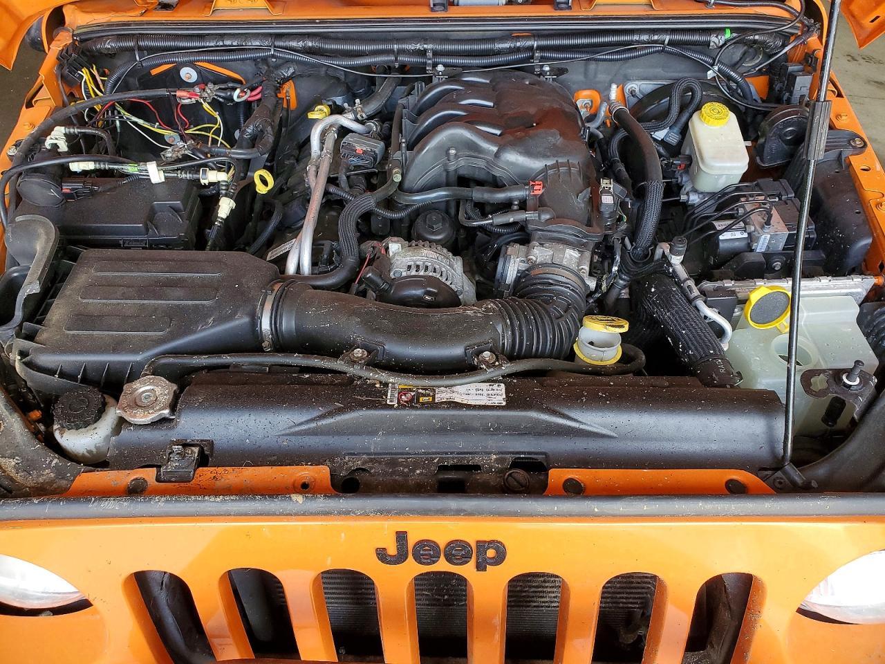 2013 Jeep Wrangler Unlimited Sahara Оранжевый vin: 1C4HJWEG9DL565022