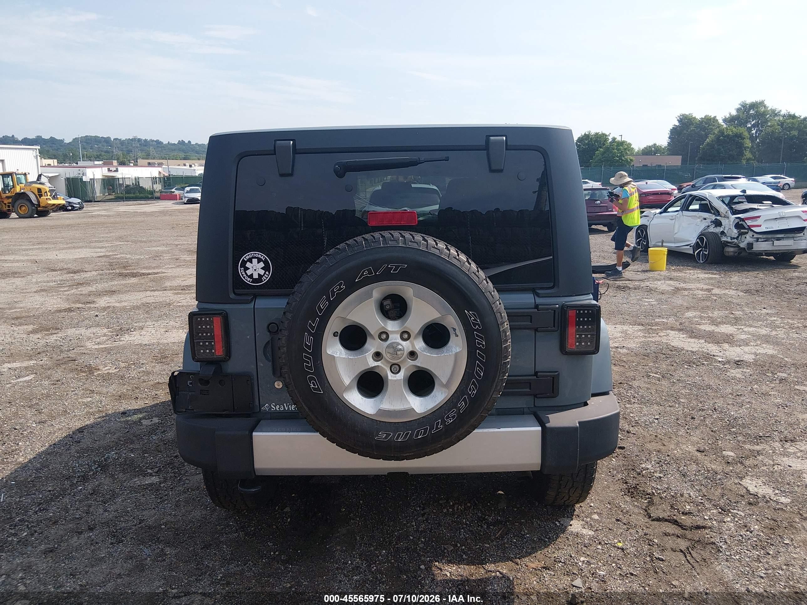 2015 Jeep Wrangler Unlimited Sahara Light Blue vin: 1C4HJWEG9FL526448