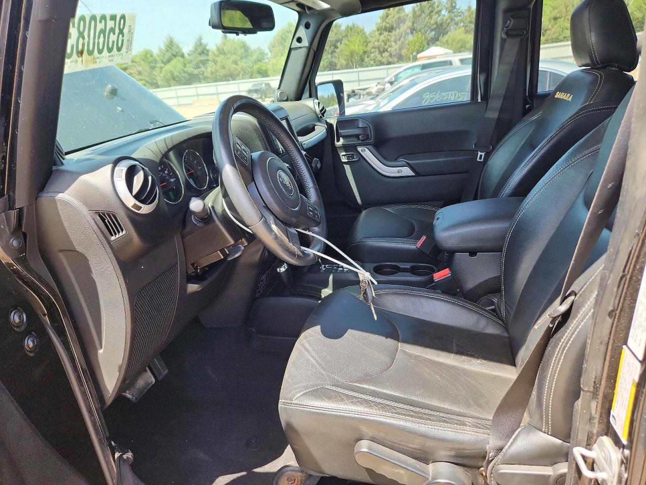 2014 Jeep Wrangler Unlimited Sahara Black vin: 1C4HJWEGXEL126056