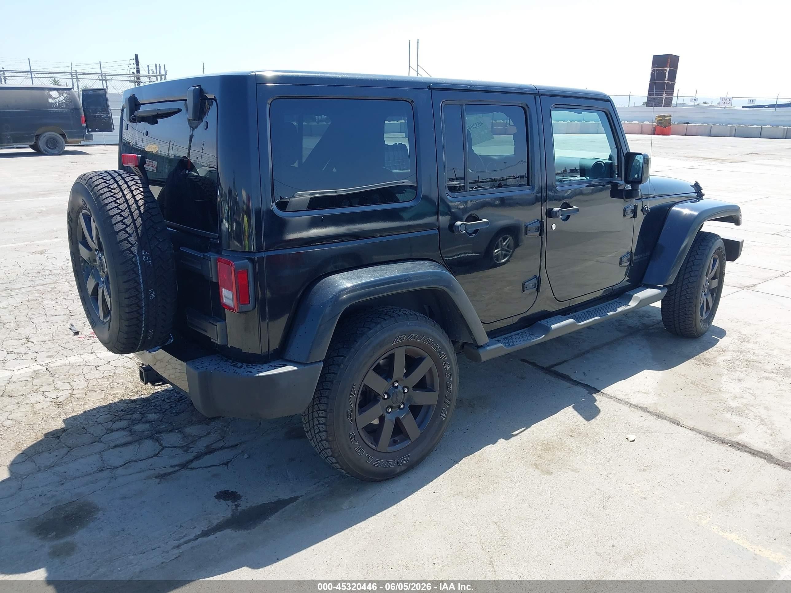 2014 Jeep Wrangler Unlimited Altitude Black vin: 1C4HJWEGXEL325267