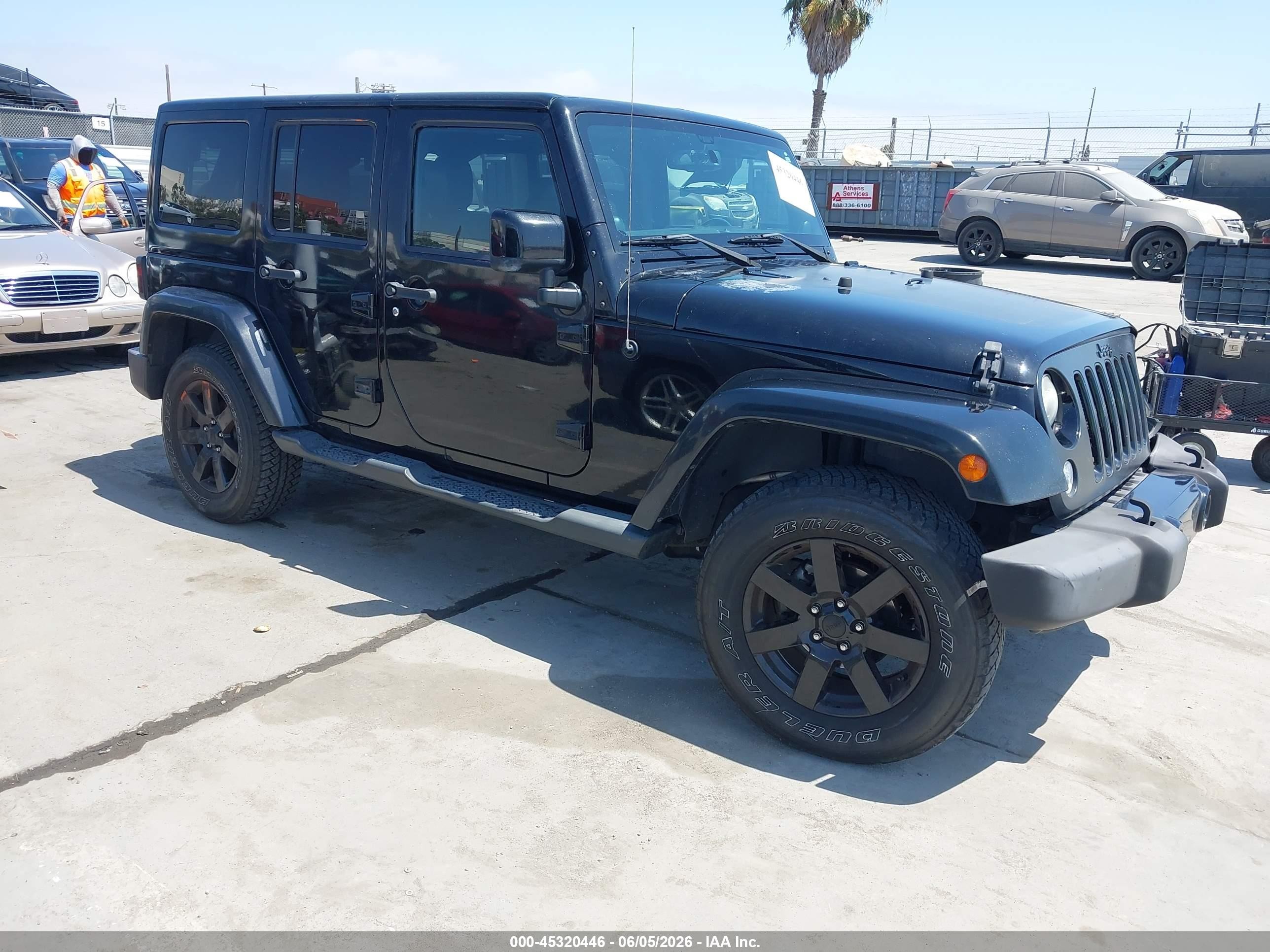 2014 Jeep Wrangler Unlimited Altitude Black vin: 1C4HJWEGXEL325267