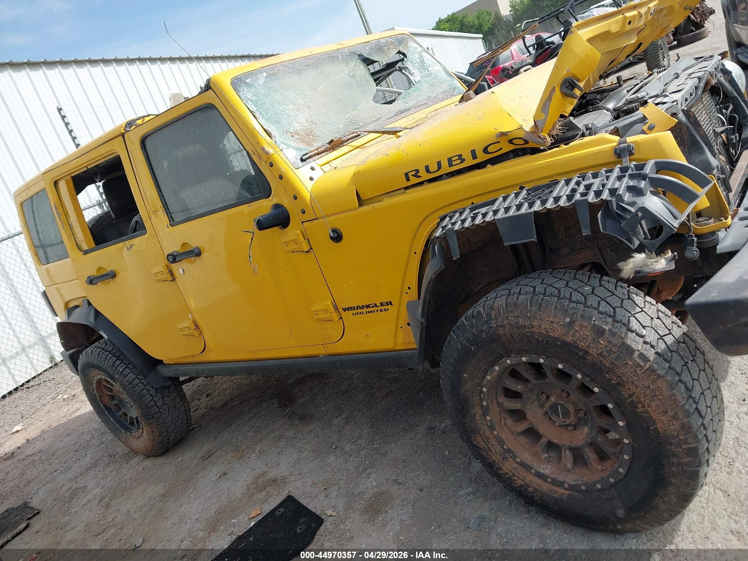 2015 Jeep Wrangler Unlimited Rubicon Yellow vin: 1C4HJWFG1FL667058
