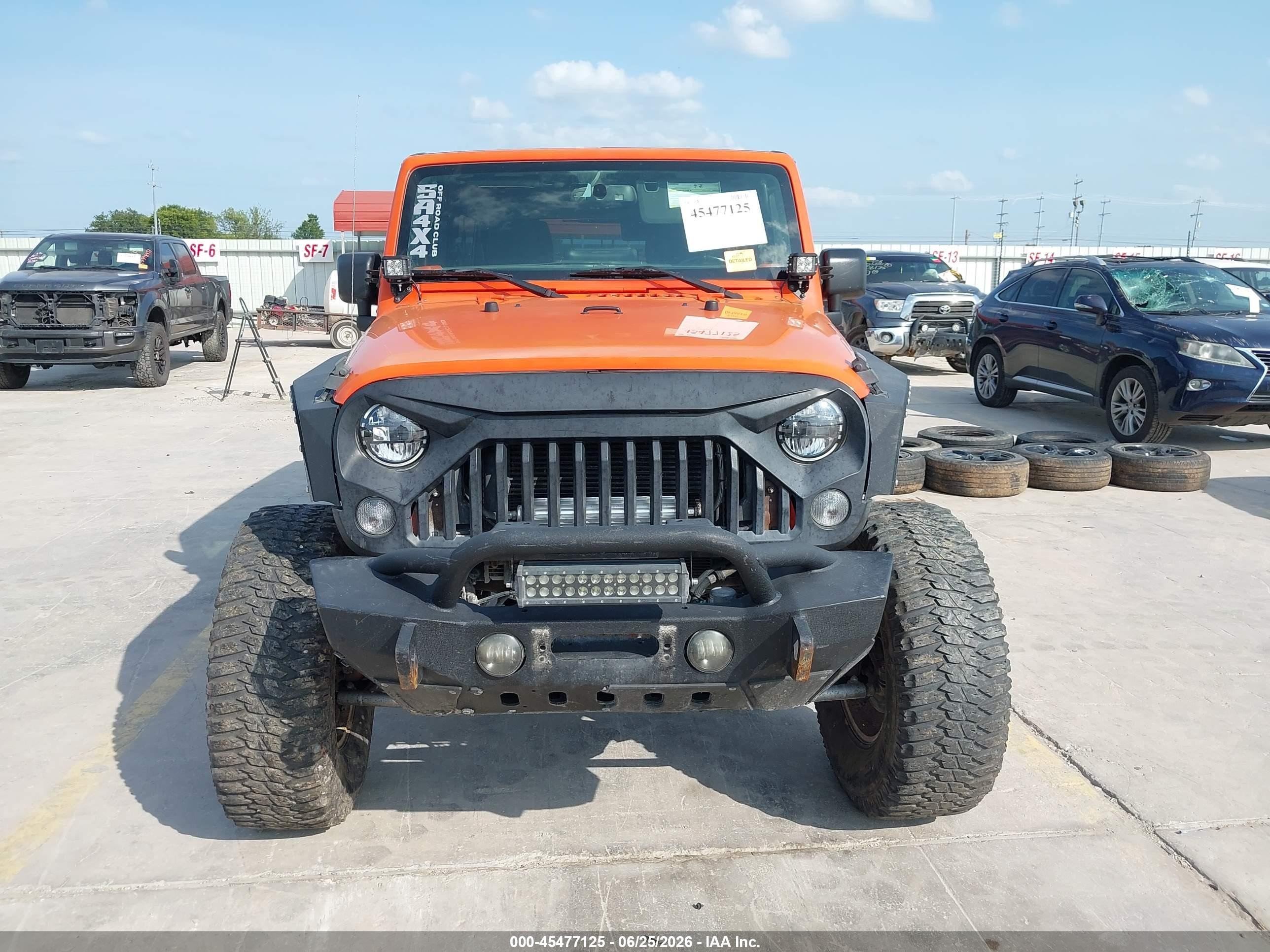 2015 Jeep Wrangler Unlimited Rubicon Orange vin: 1C4HJWFG5FL734535