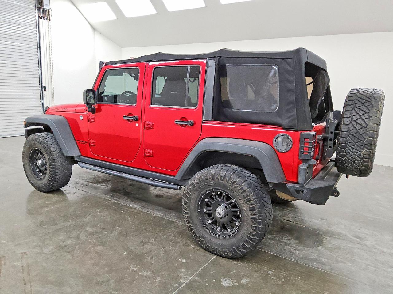 2014 Jeep Wrangler Unlimited Rubicon Red vin: 1C4HJWFG8EL118357