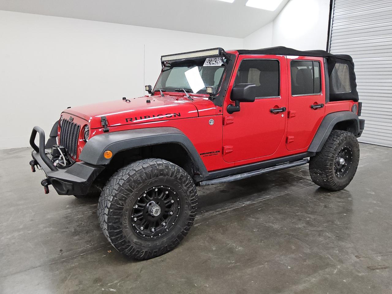 2014 Jeep Wrangler Unlimited Rubicon Red vin: 1C4HJWFG8EL118357 Damage: Front Bumper Extension, Aftermarket, Acceptable