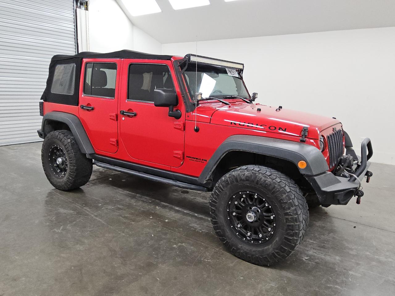 2014 Jeep Wrangler Unlimited Rubicon Red vin: 1C4HJWFG8EL118357 Damage: Right Rear Wheel, Aftermarket, Acceptable