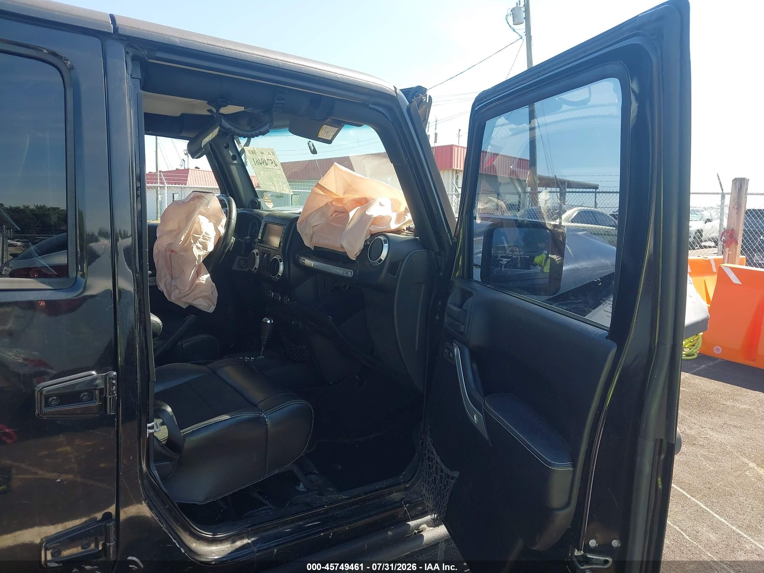 2012 Jeep Wrangler Unlimited Rubicon Черный vin: 1C4HJWFG9CL205083