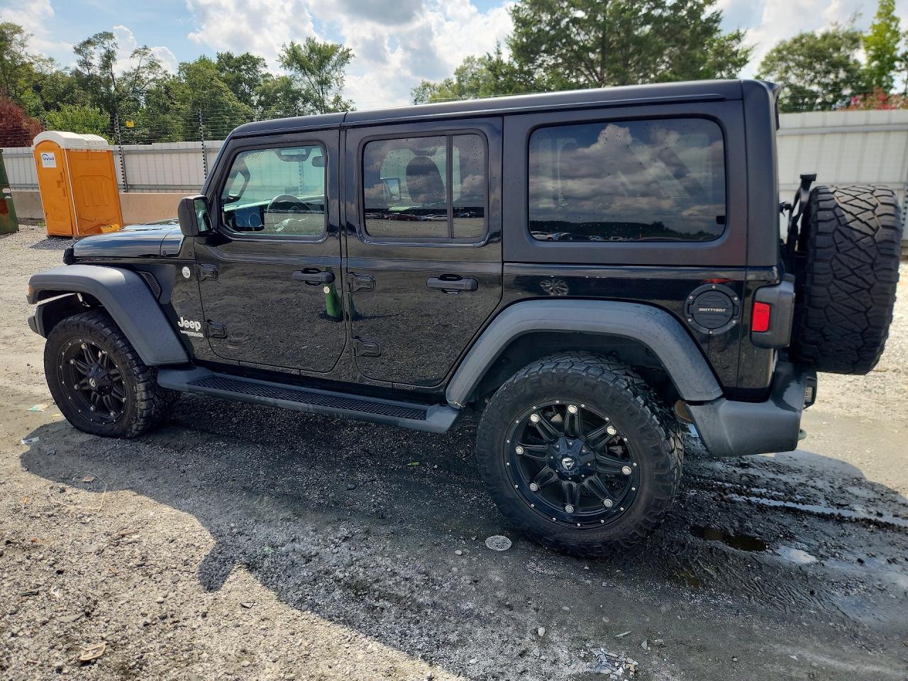 2020 Jeep Wrangler Unlimited Sport Черный vin: 1C4HJXDG1LW274633