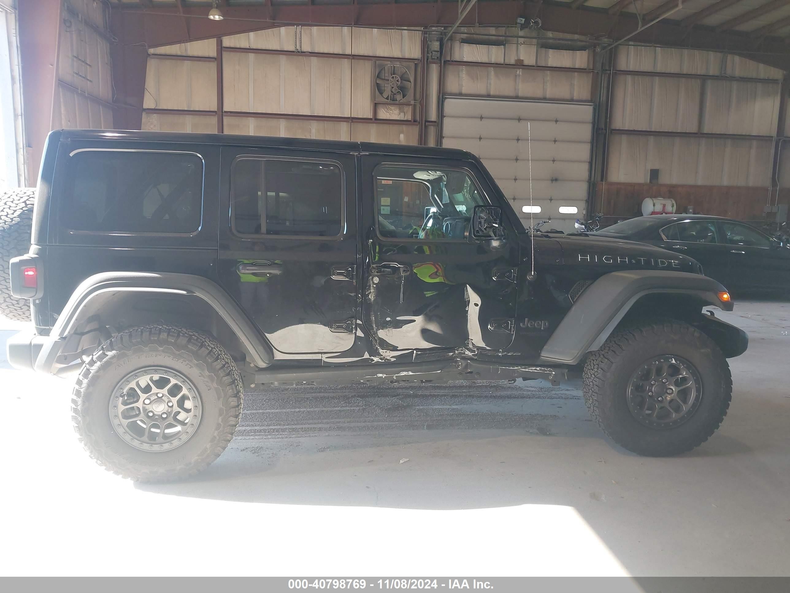2022 Jeep Wrangler Unlimited High Tide 4x4 Black vin: 1C4HJXDG8NW203559