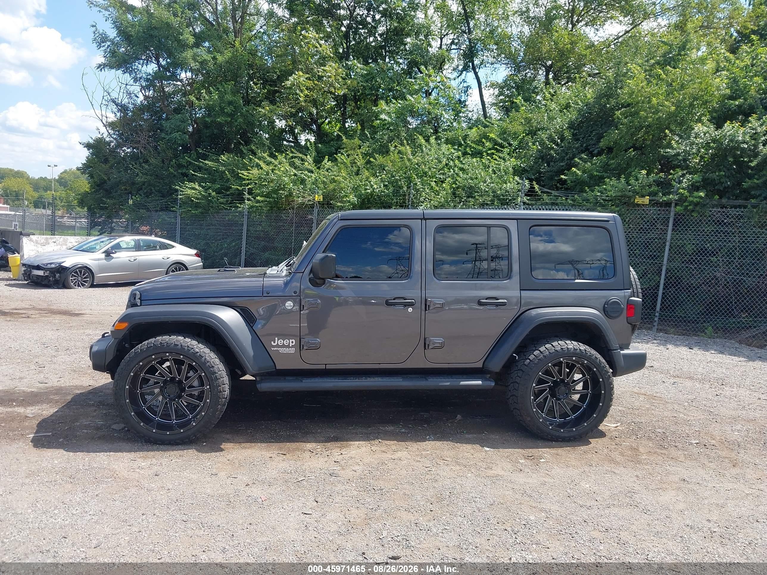 2019 Jeep Wrangler Unlimited Sport S 4x4 Серый vin: 1C4HJXDN1KW668470