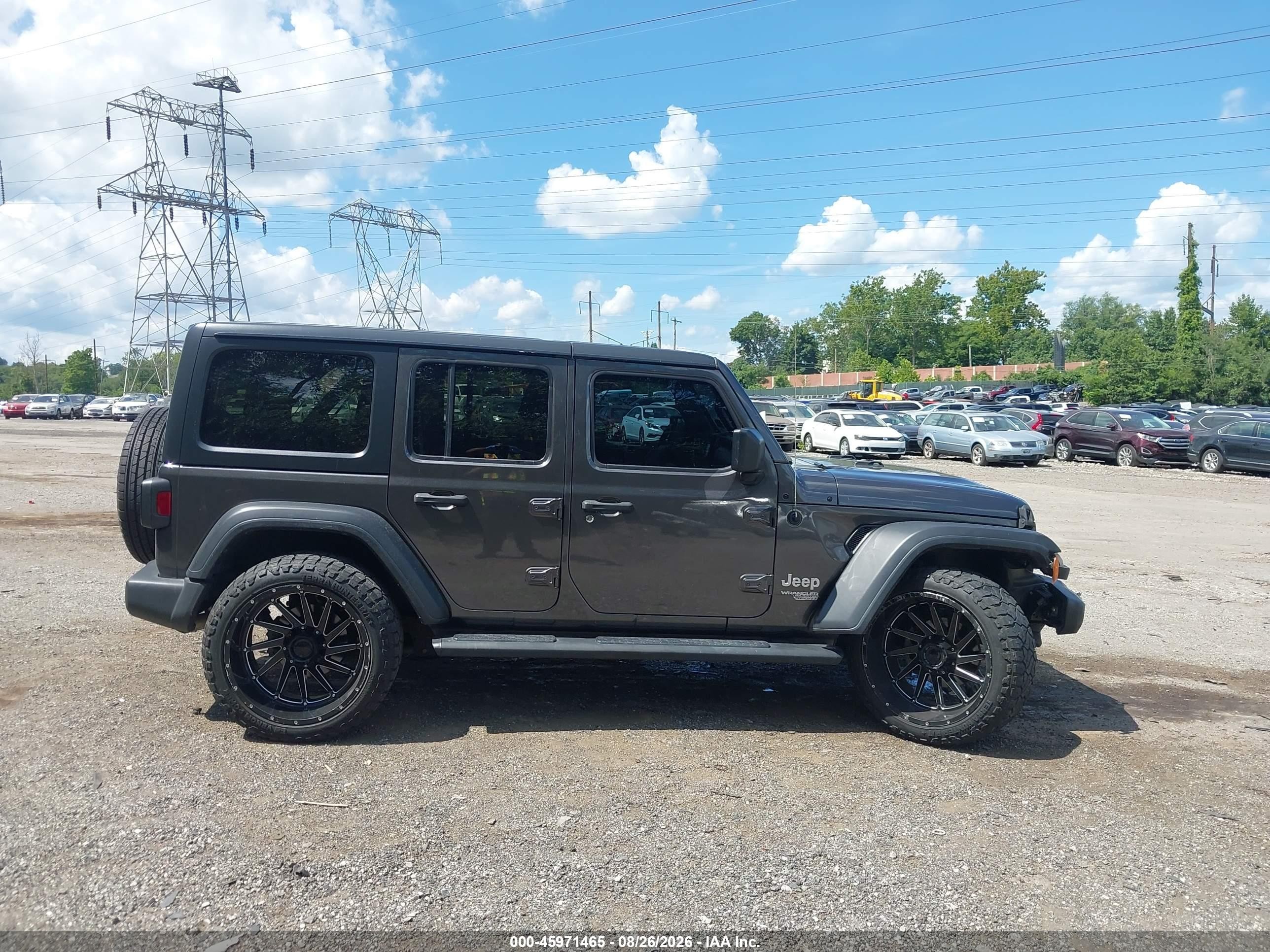2019 Jeep Wrangler Unlimited Sport S 4x4 Серый vin: 1C4HJXDN1KW668470
