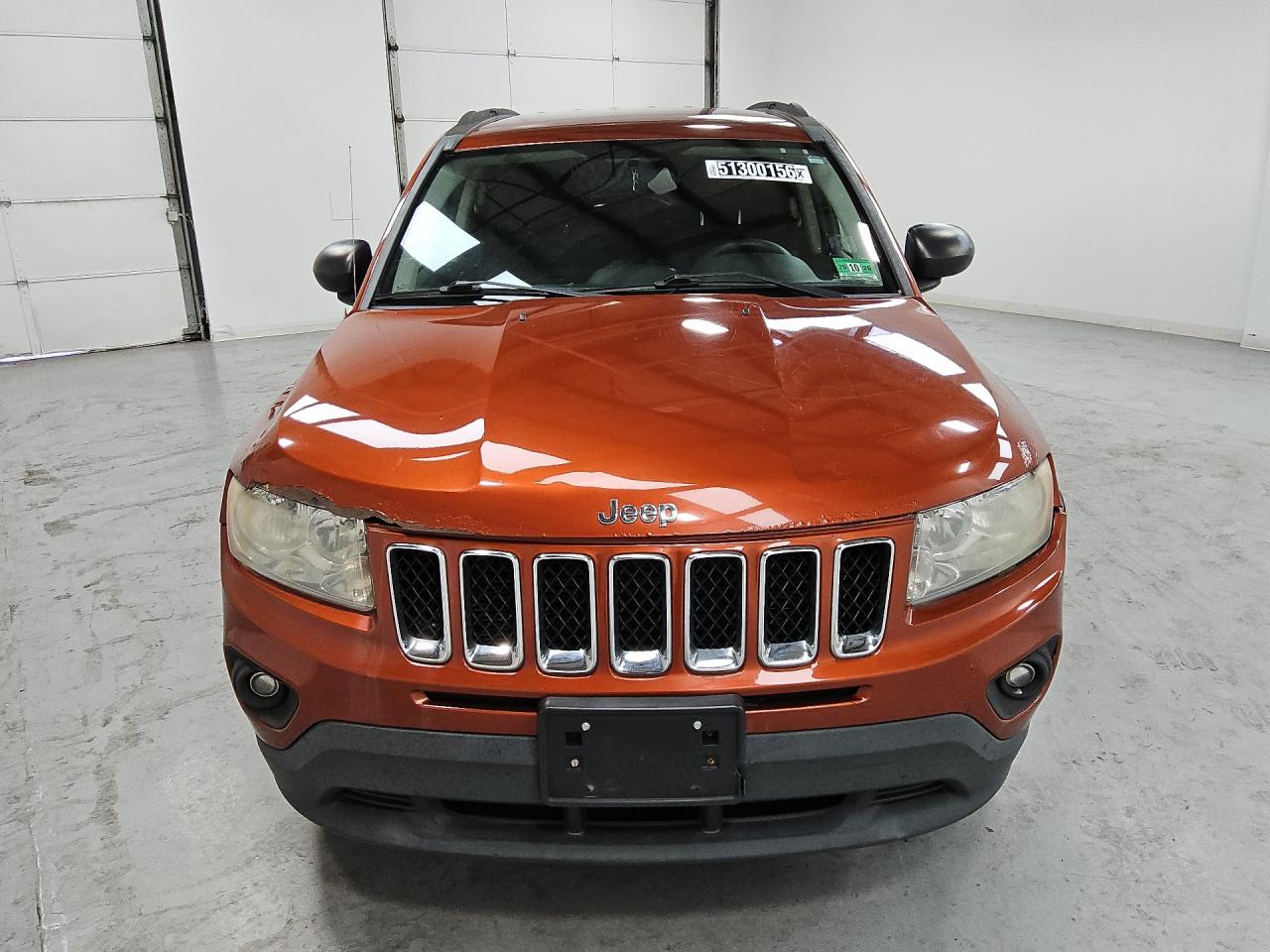 2012 Jeep Compass Sport Orange vin: 1C4NJCBA8CD605892 Damage: Hood, Corrosion, Severe Damage