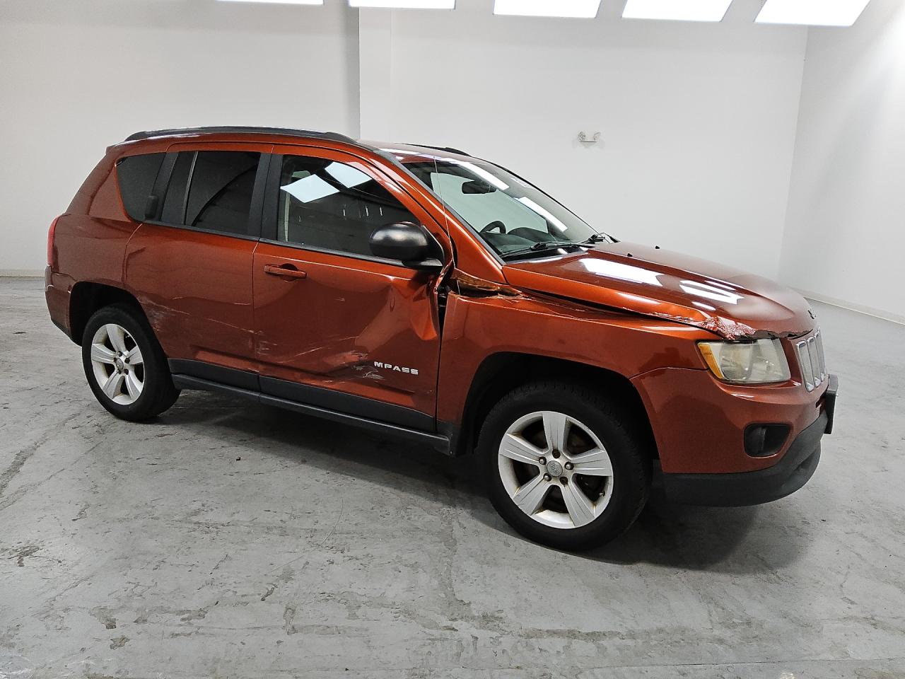 2012 Jeep Compass Sport Orange vin: 1C4NJCBA8CD605892 Damage: Right Front Door, Severe Damage, Replacement Required