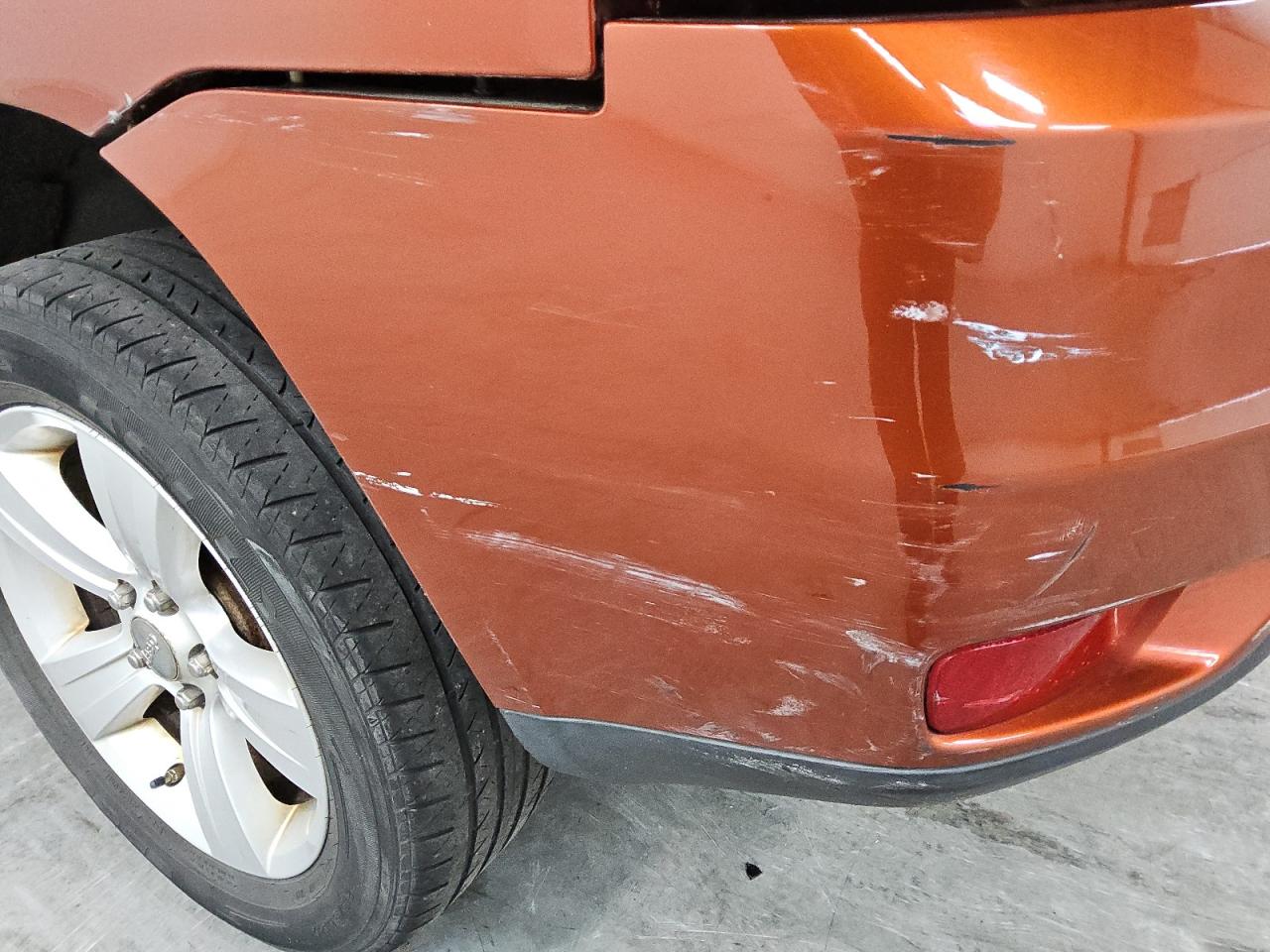 2012 Jeep Compass Sport Orange vin: 1C4NJCBA8CD605892 Damage: Rear Bumper, Broken, Replacement Required