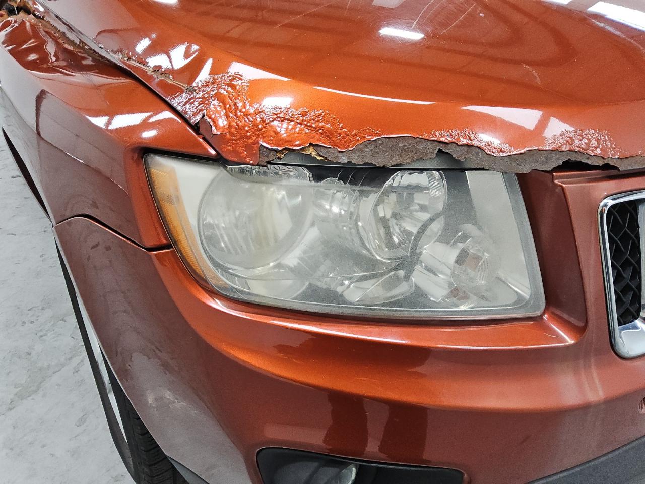 2012 Jeep Compass Sport Orange vin: 1C4NJCBA8CD605892 Damage: Right Head Lamp, Faded, Repair Required