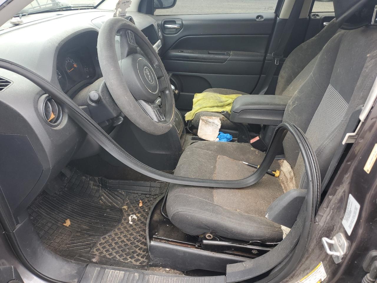2015 Jeep Compass Sport Gray vin: 1C4NJDBB8FD257191 Damage: Left Front Seat, Stained, Permanent