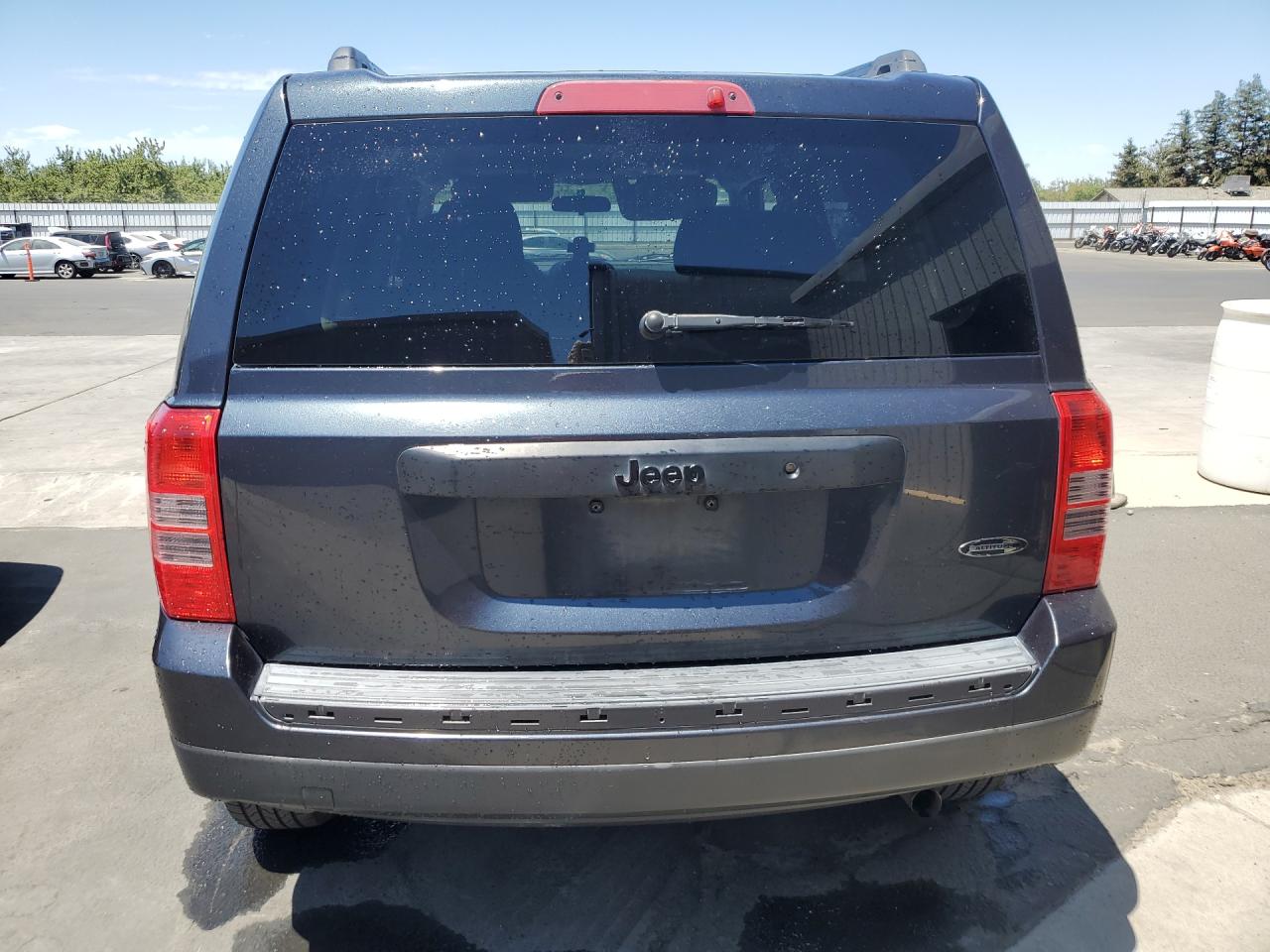 2014 Jeep Patriot Sport Charcoal vin: 1C4NJPBA1ED753926 Damage: Rear Bumper Molding, Missing, Replacement Required